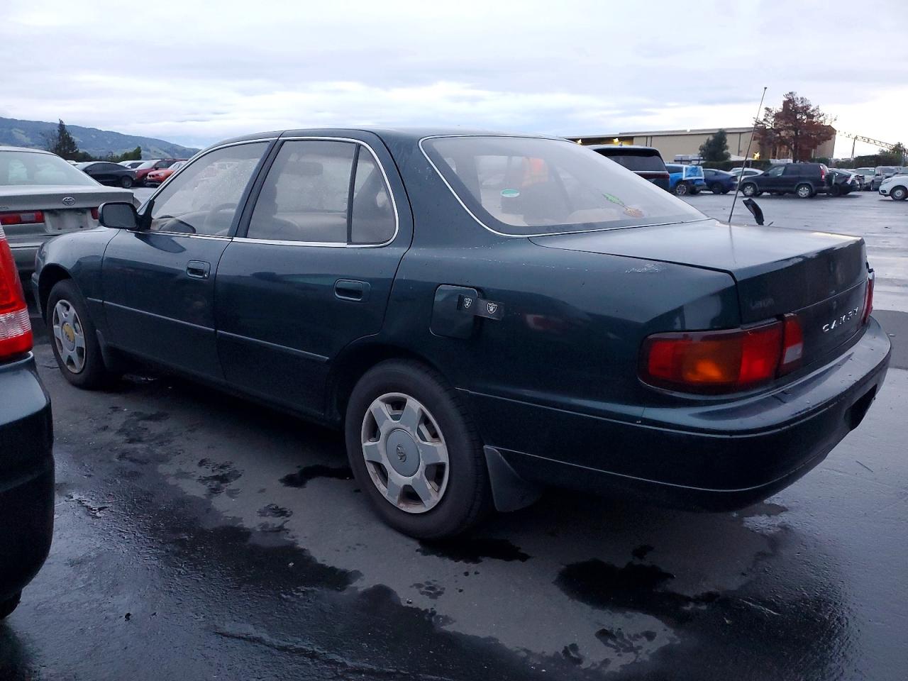 1995 Toyota Camry Le Green vin: JT2GK12E1S0124877