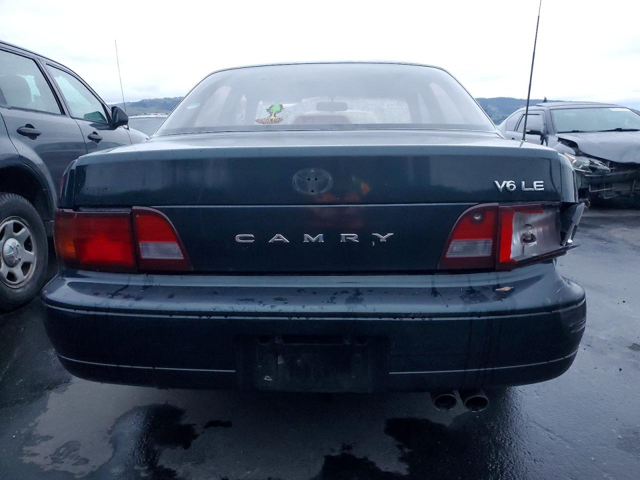 1995 Toyota Camry Le Green vin: JT2GK12E1S0124877