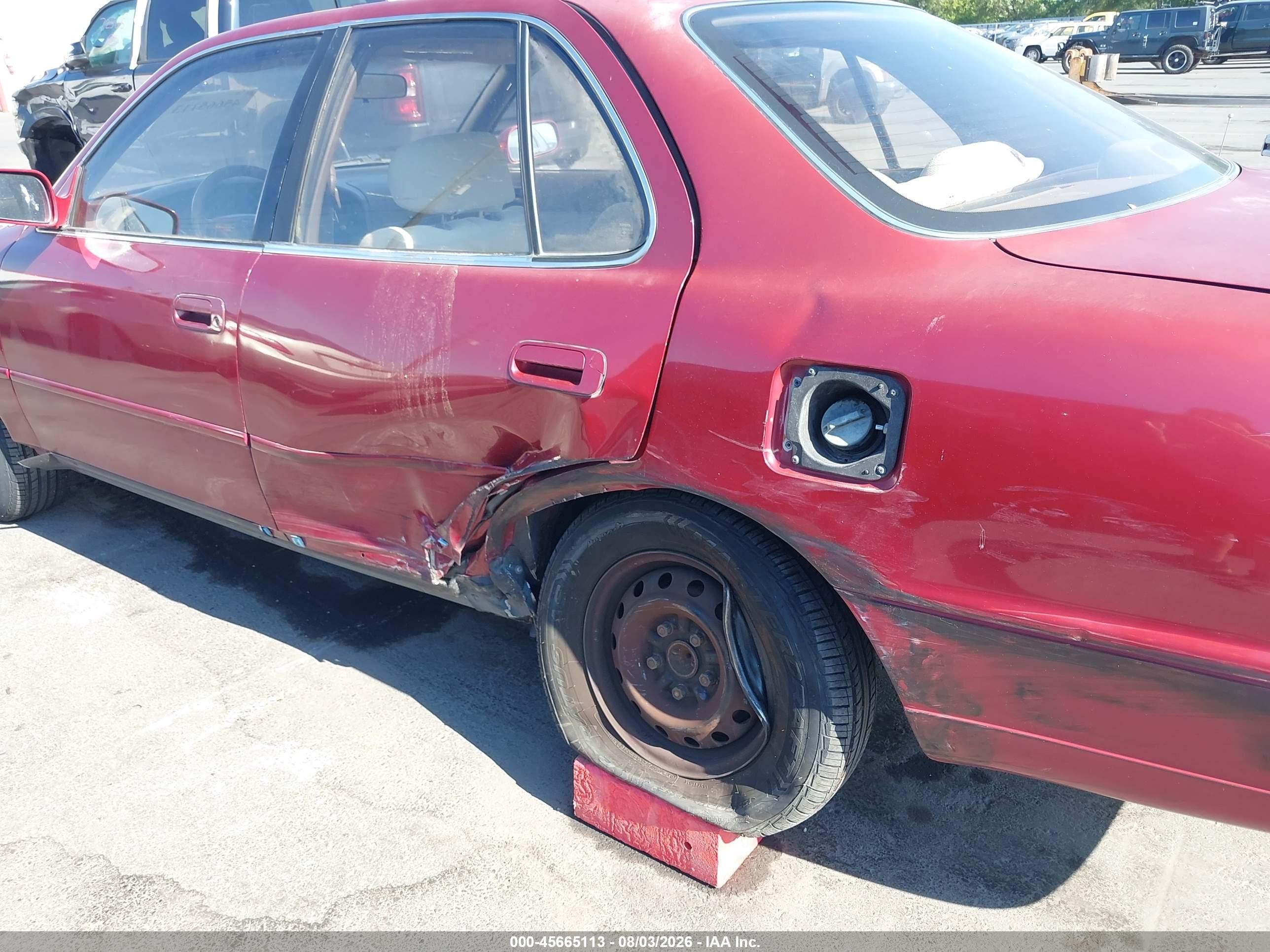 1994 Toyota Camry Le Red vin: JT2SK12E1R0244098