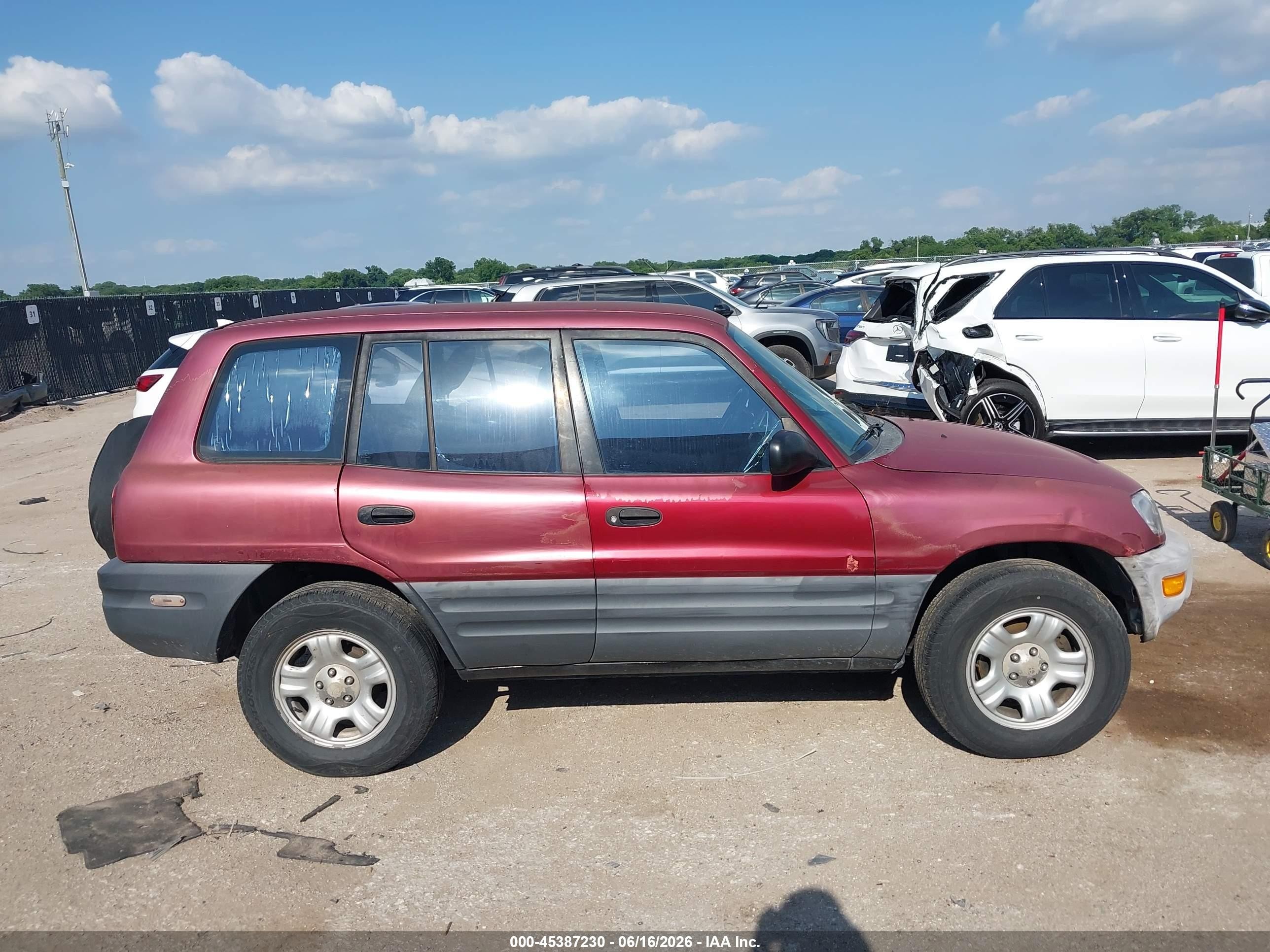 1999 Toyota Rav4   Red vin: JT3GP10V0X7042251