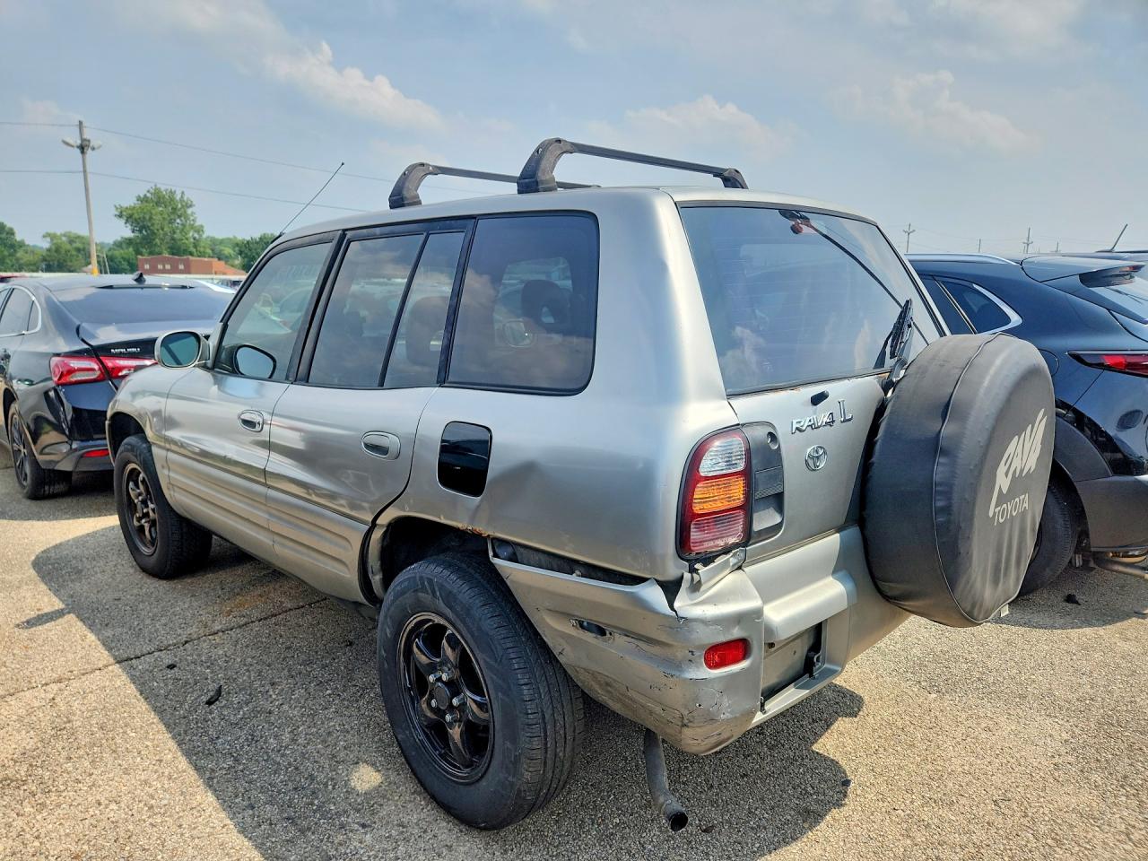 1999 Toyota Rav4 Base Silver vin: JT3GP10V1X7064095