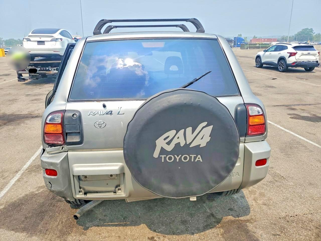 1999 Toyota Rav4 Base Silver vin: JT3GP10V1X7064095