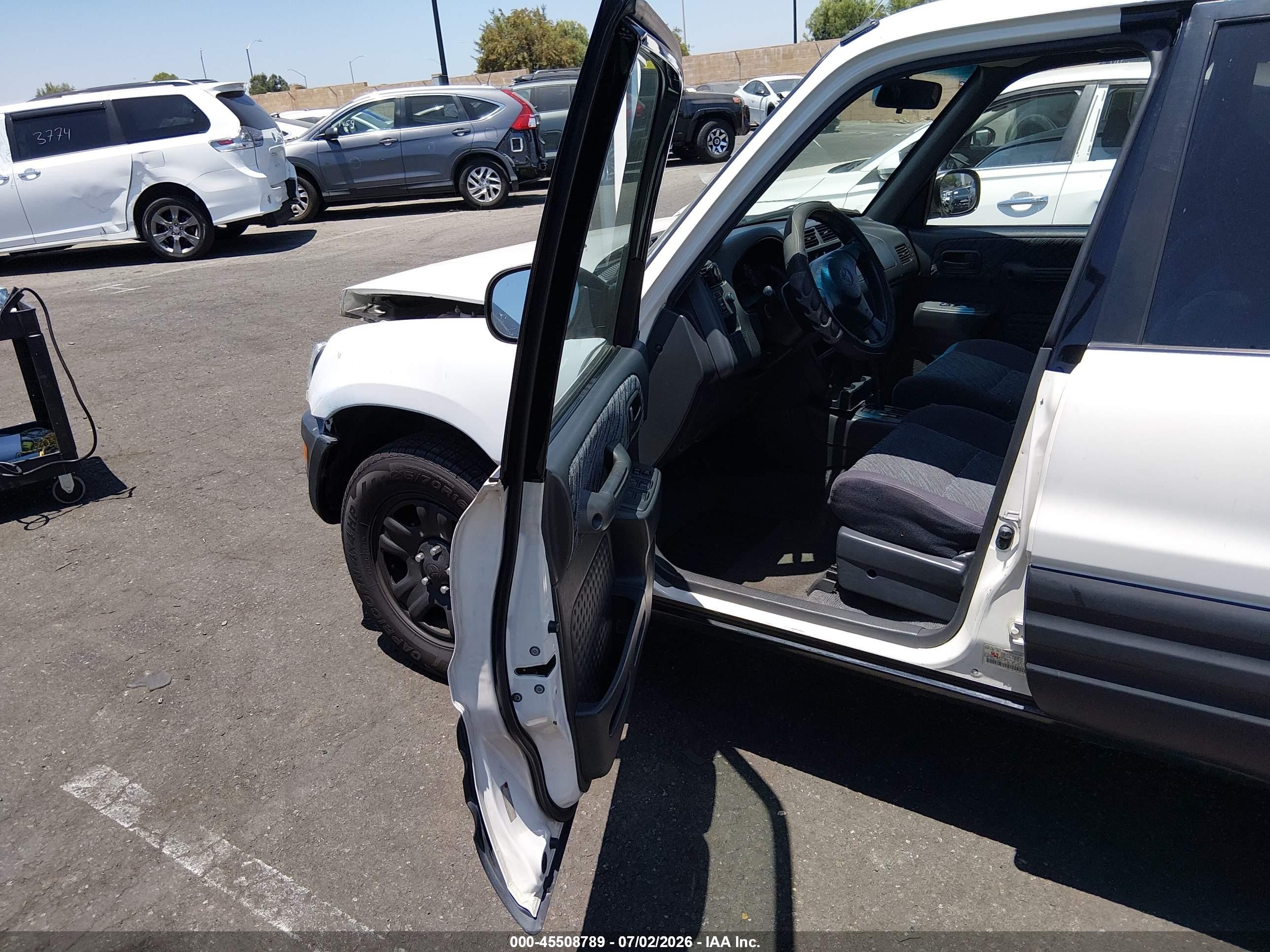 1999 Toyota Rav4   White vin: JT3GP10V2X7055230