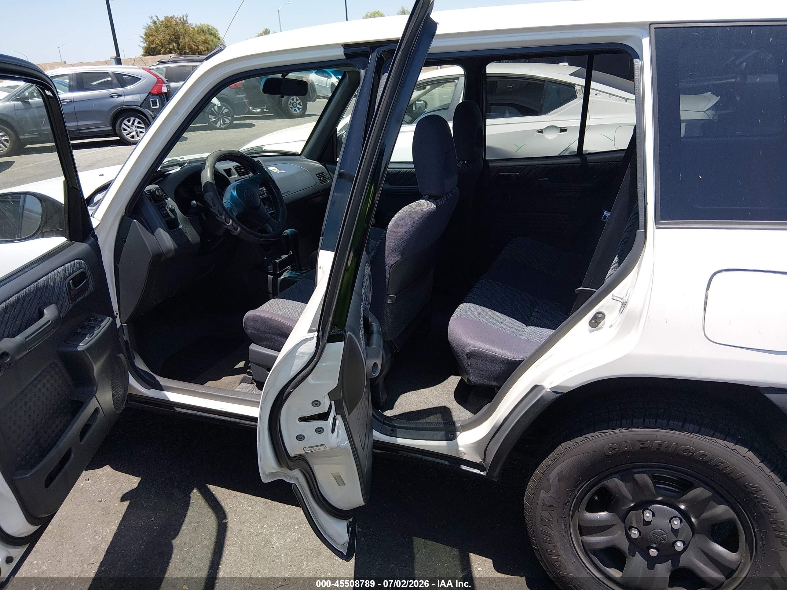 1999 Toyota Rav4   White vin: JT3GP10V2X7055230