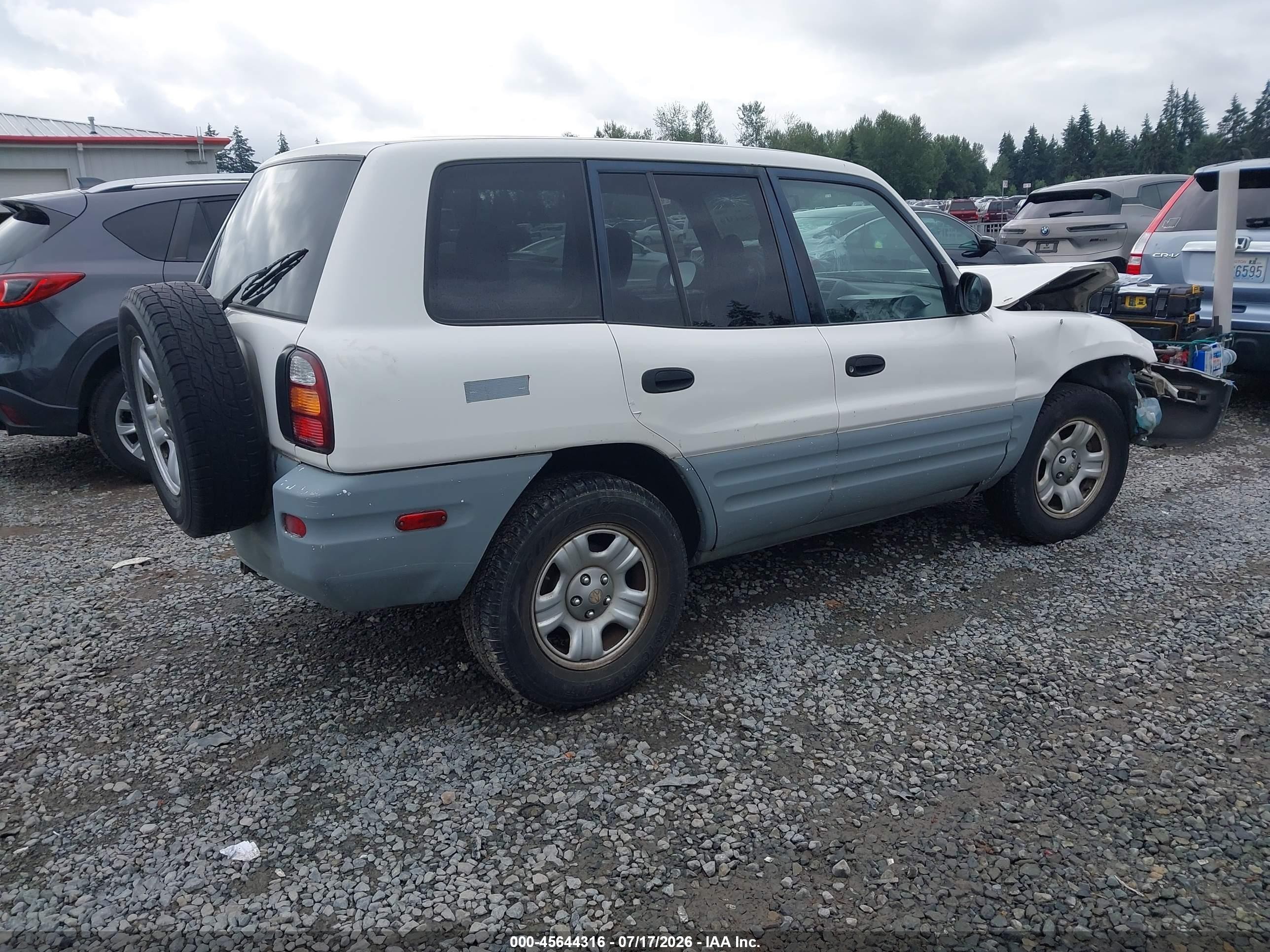 2000 Toyota Rav4   White vin: JT3GP10V2Y7077021