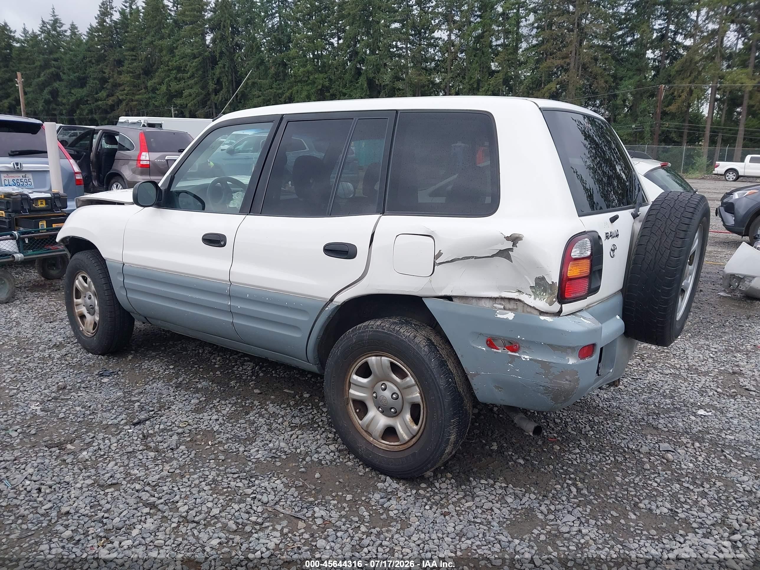 2000 Toyota Rav4   White vin: JT3GP10V2Y7077021