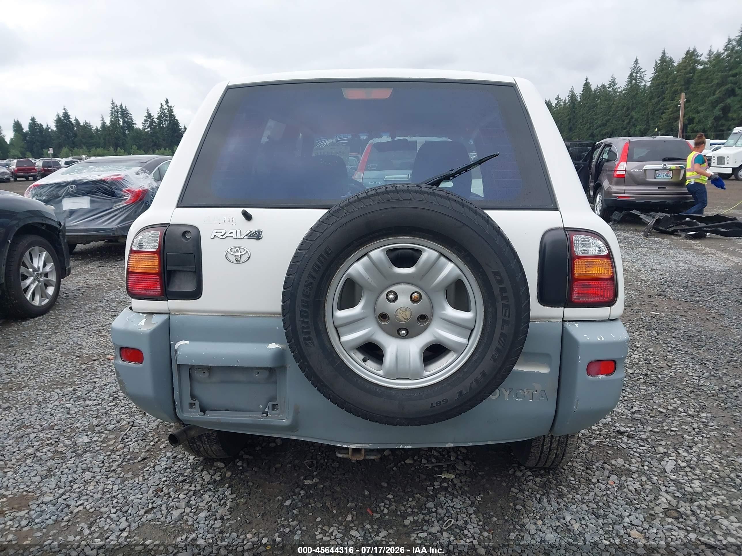 2000 Toyota Rav4   White vin: JT3GP10V2Y7077021