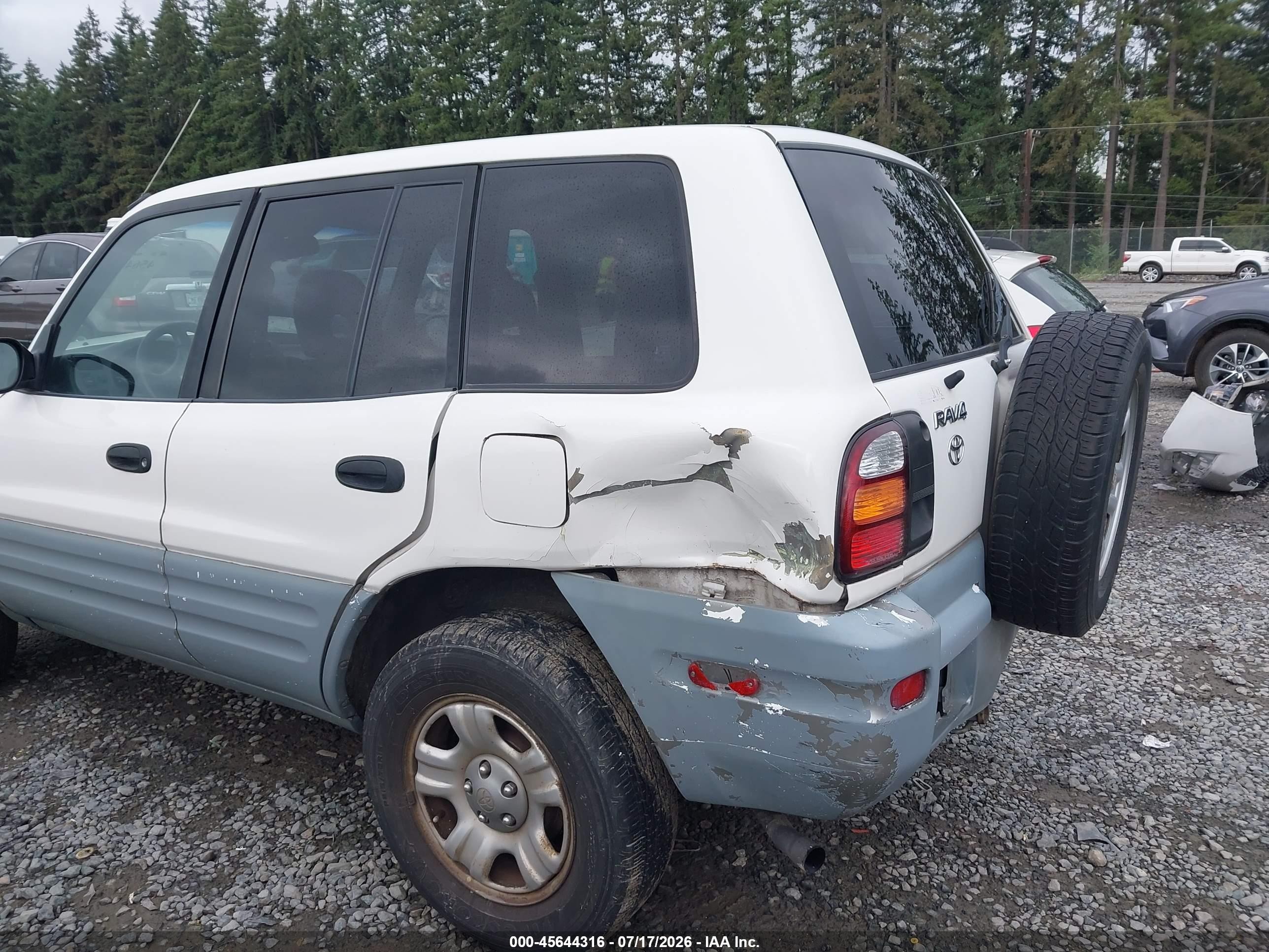 2000 Toyota Rav4   White vin: JT3GP10V2Y7077021
