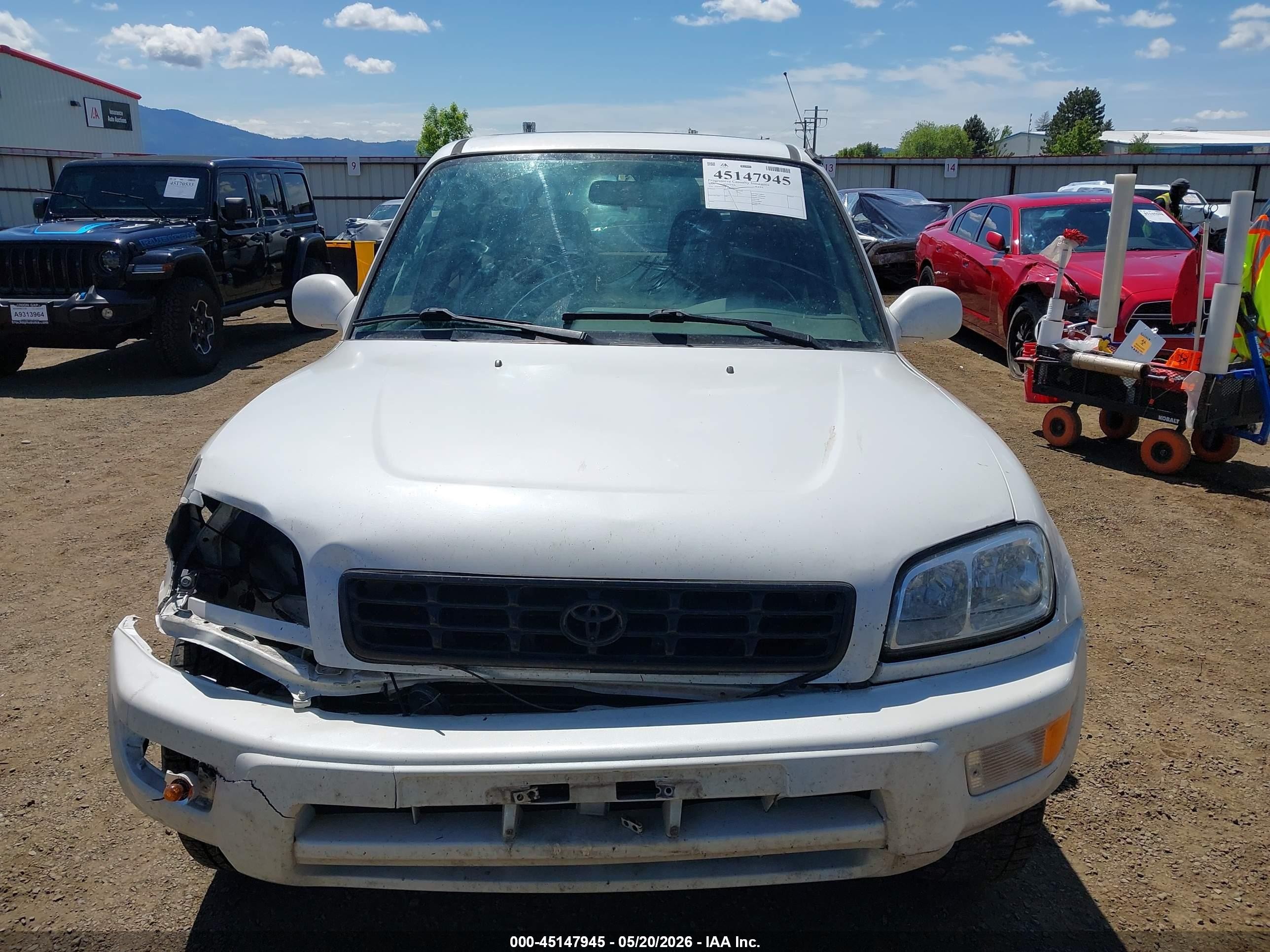 2000 Toyota Rav4   White vin: JT3GP10V4Y7071690