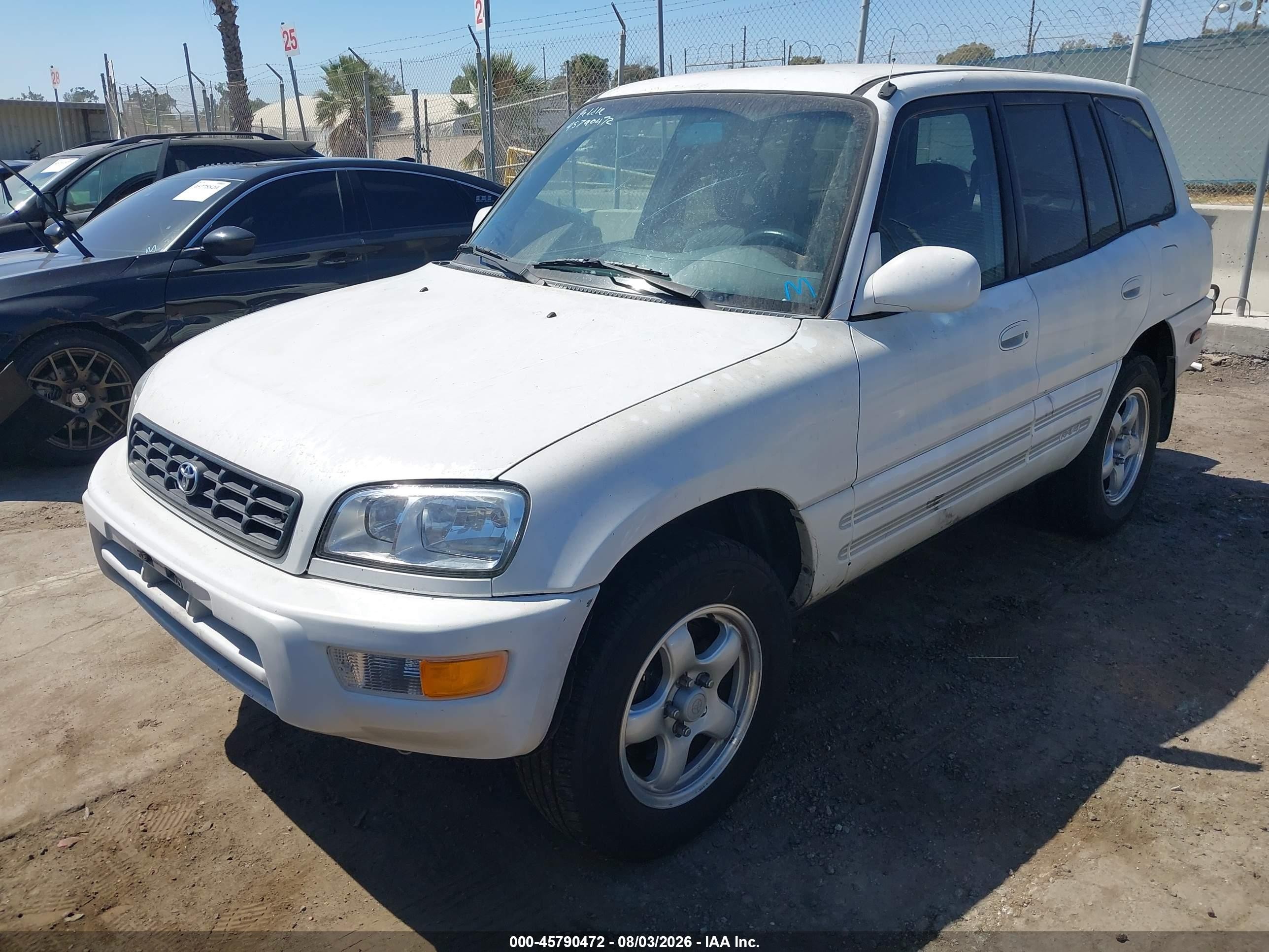 1999 Toyota Rav4   White vin: JT3GP10V5X7053553