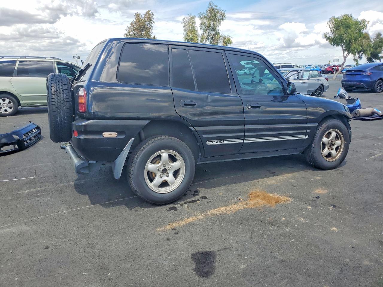 1999 Toyota Rav4 Base Black vin: JT3GP10V5X7054881