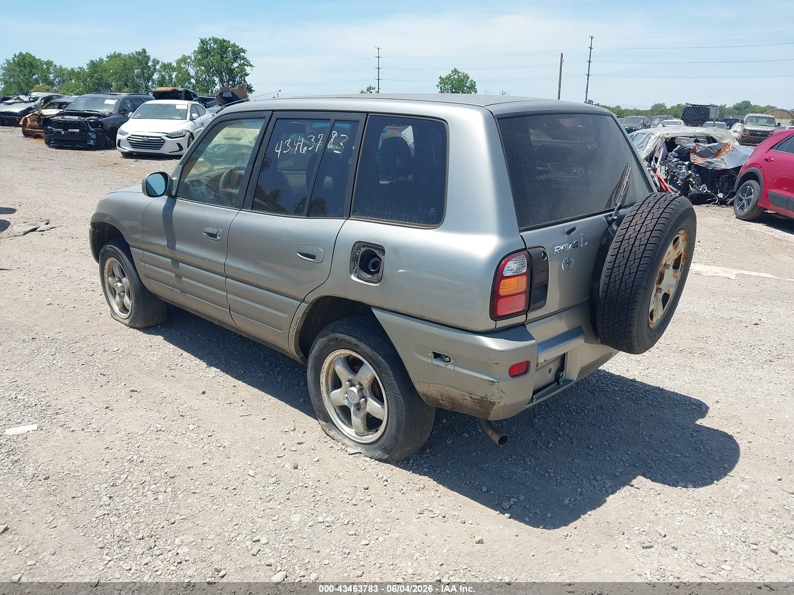 1999 Toyota Rav4 Gold vin: JT3GP10V6X7054761