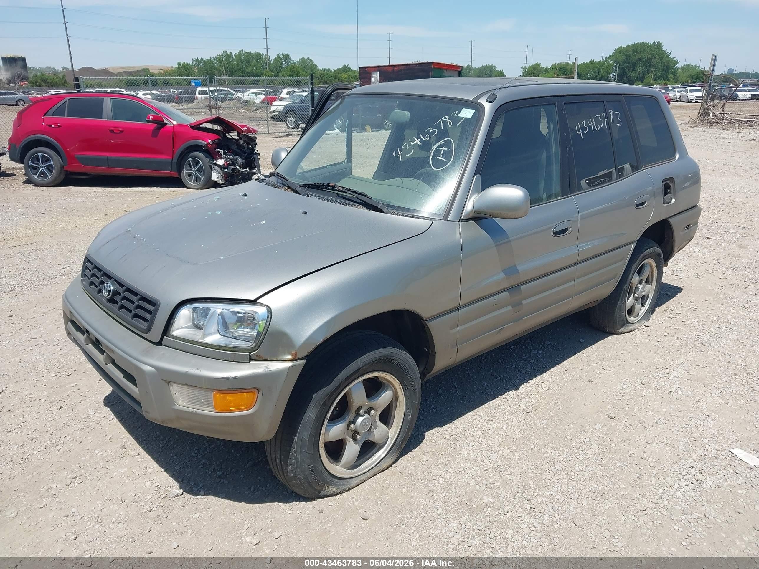 1999 Toyota Rav4 Gold vin: JT3GP10V6X7054761