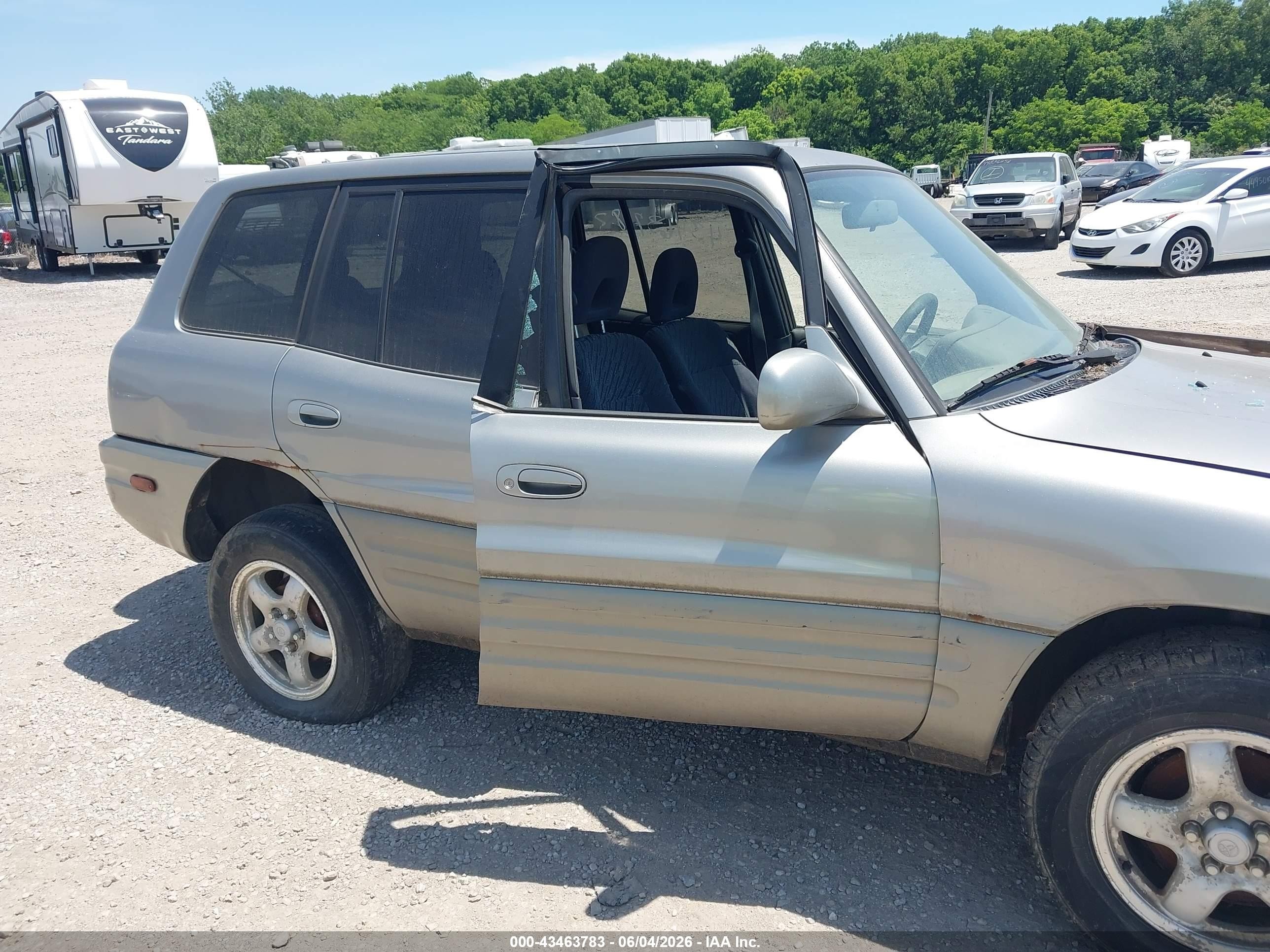 1999 Toyota Rav4 Gold vin: JT3GP10V6X7054761