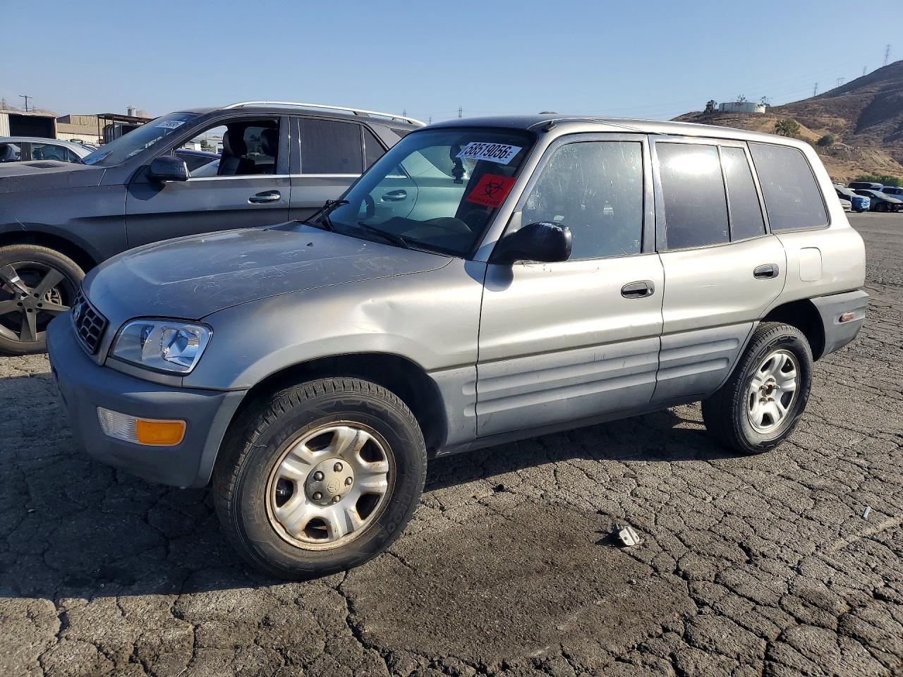 1999 Toyota Rav4 Base Silver vin: JT3GP10V9X7057105