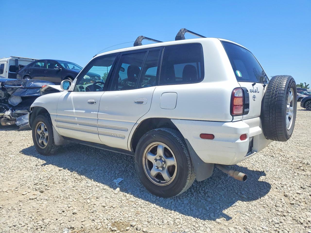 1999 Toyota Rav4 Base White vin: JT3GP10V9X7064474