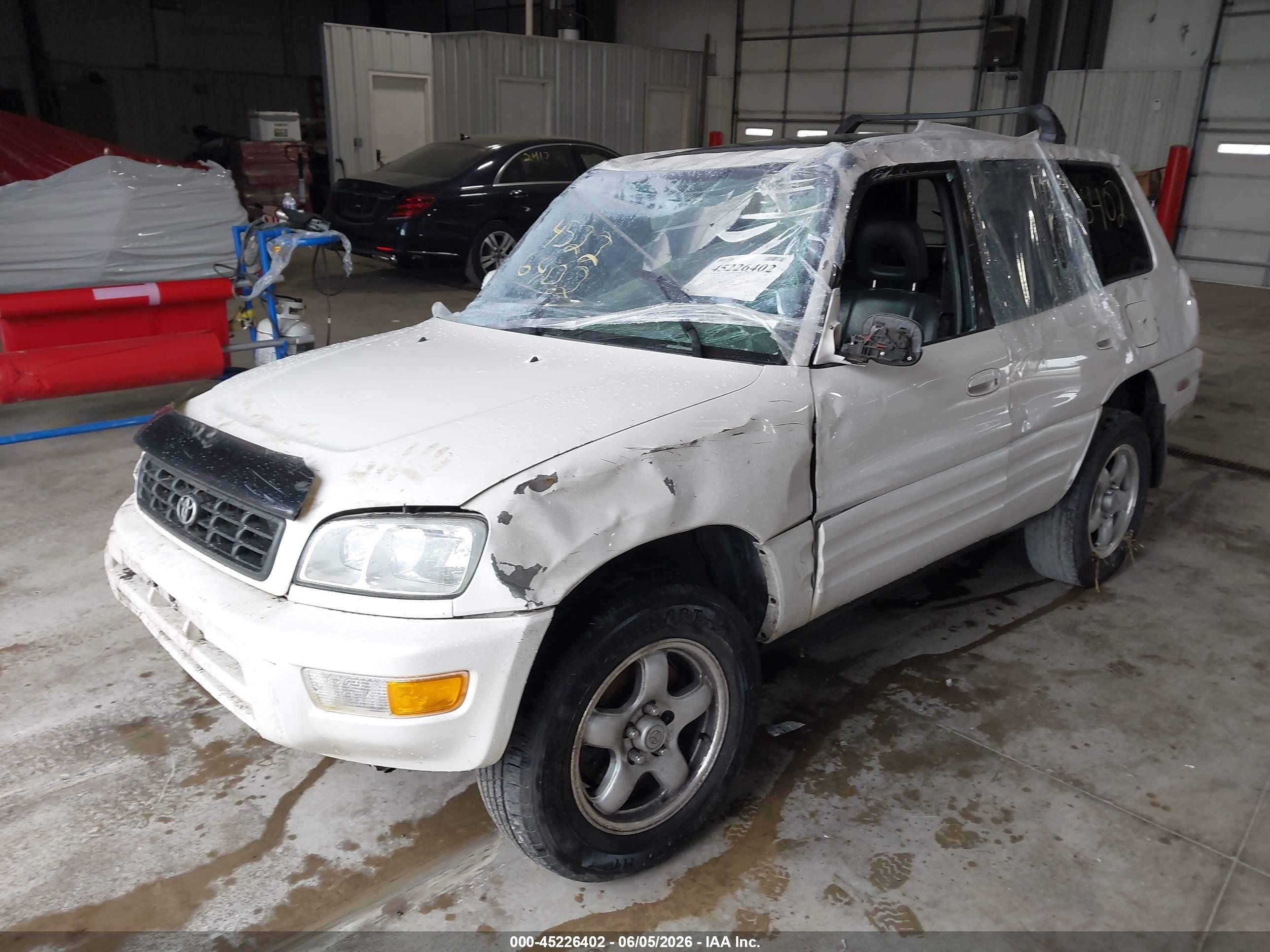 1999 Toyota Rav4   White vin: JT3HP10V3X7140453