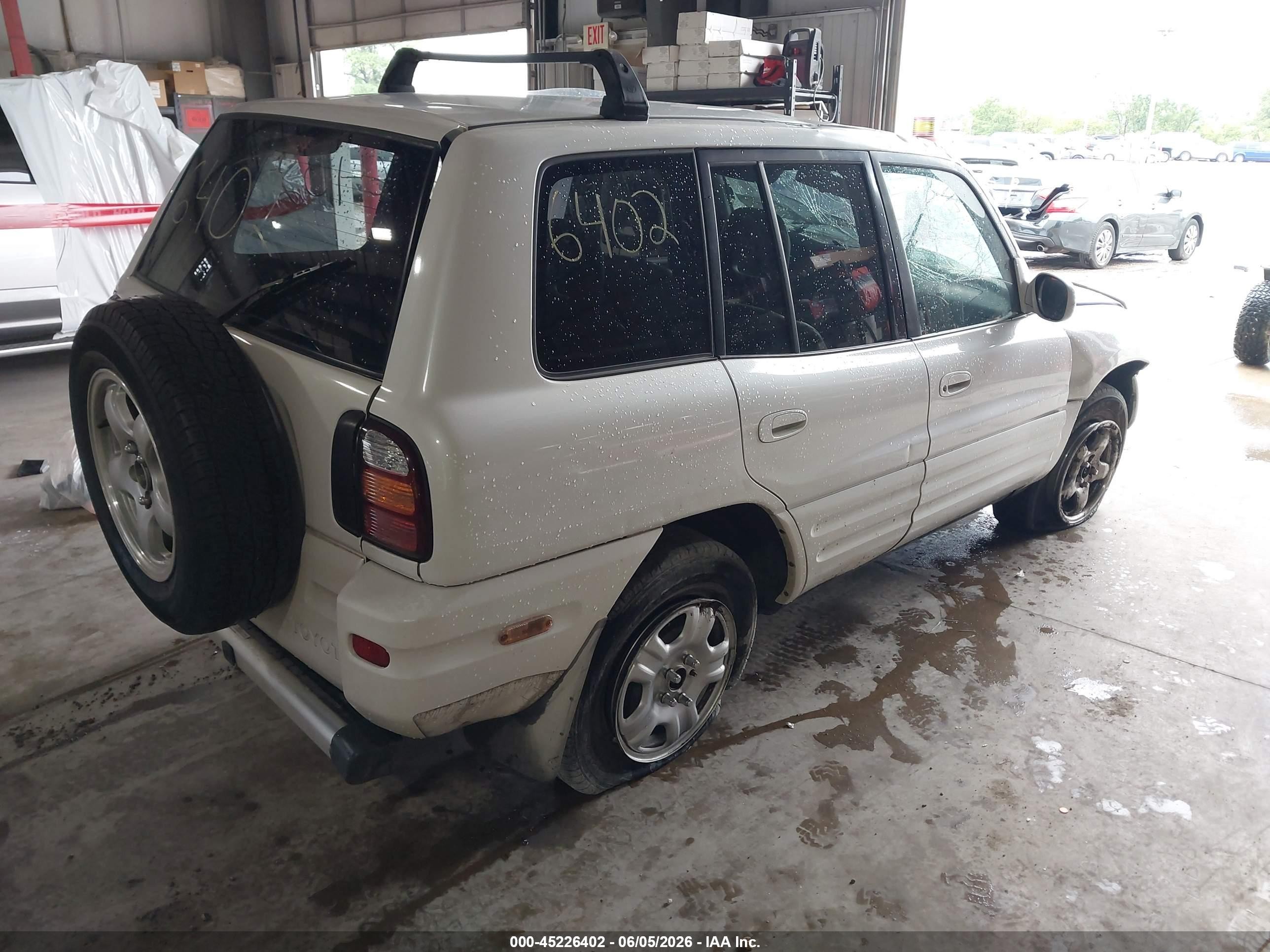1999 Toyota Rav4   White vin: JT3HP10V3X7140453