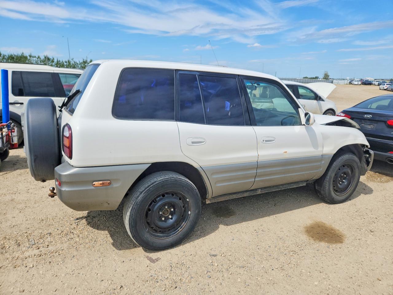 1999 Toyota Rav4 Base White vin: JT3HP10V6X7118222