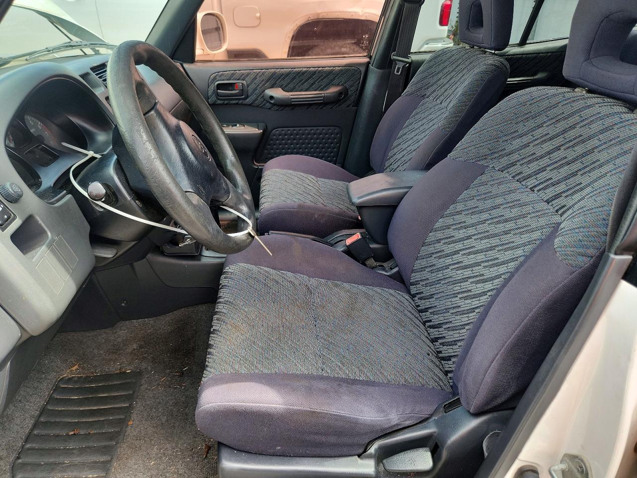 2000 Toyota Rav4 Base White vin: JT3HP10V6Y7168698