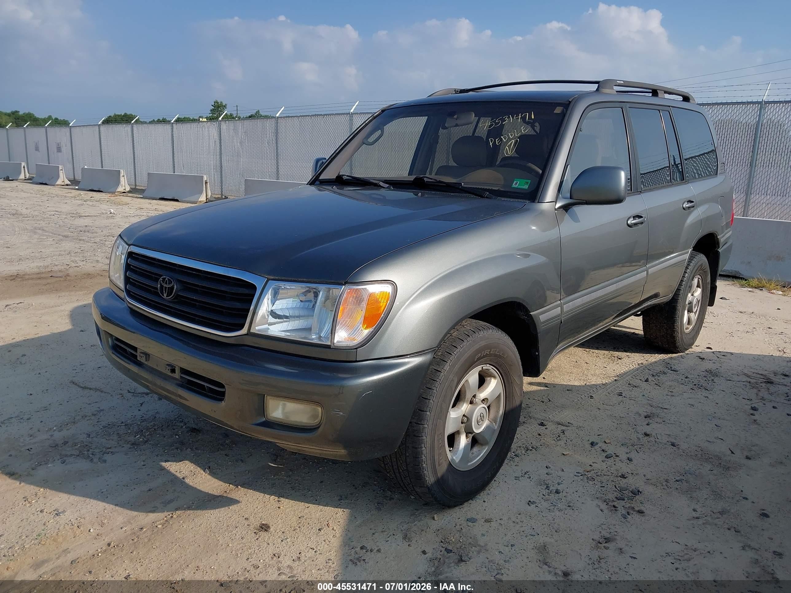 1999 Toyota Land Cruiser   Brown vin: JT3HT05J0X0055574