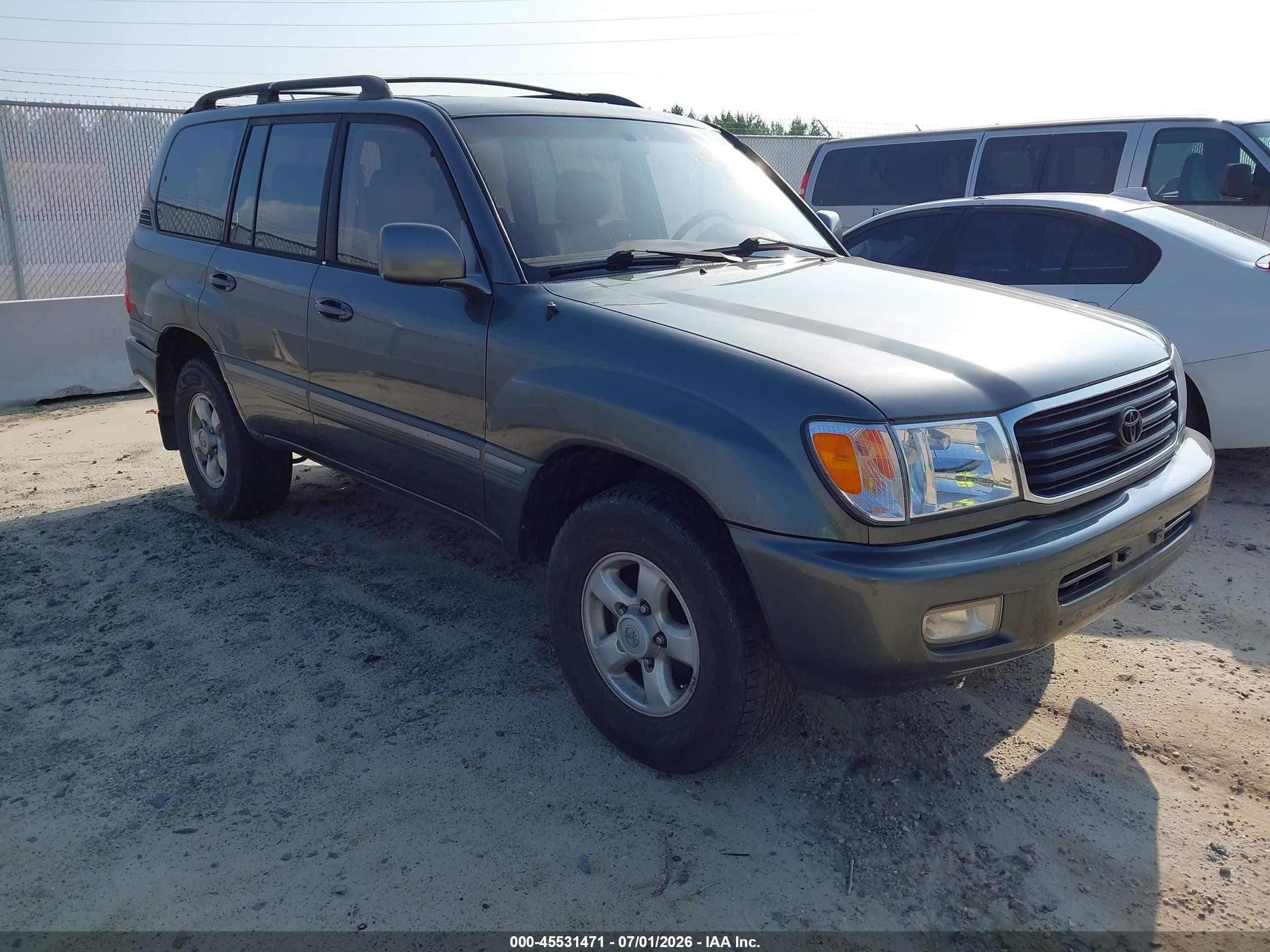 1999 Toyota Land Cruiser   Brown vin: JT3HT05J0X0055574