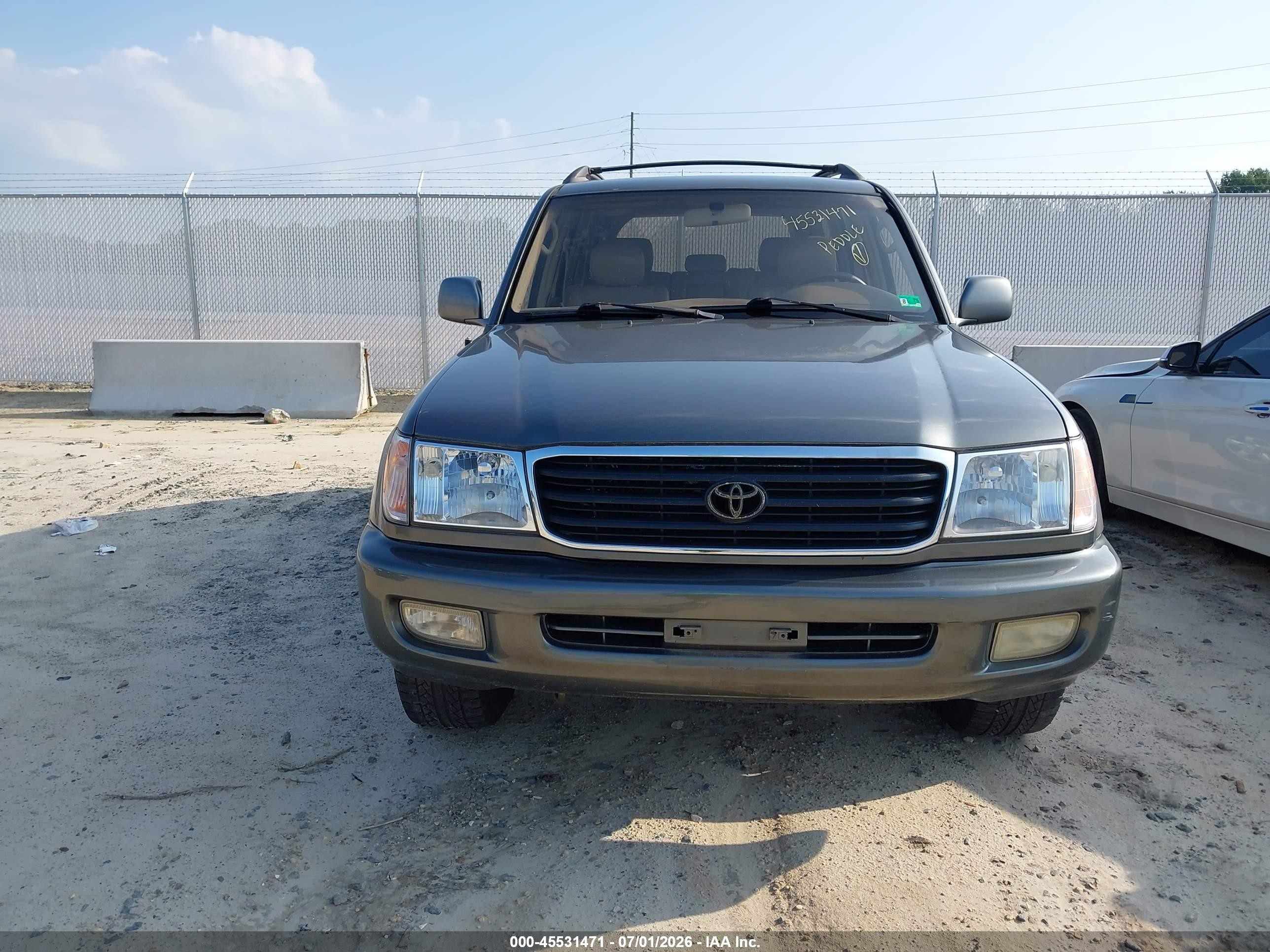1999 Toyota Land Cruiser   Brown vin: JT3HT05J0X0055574