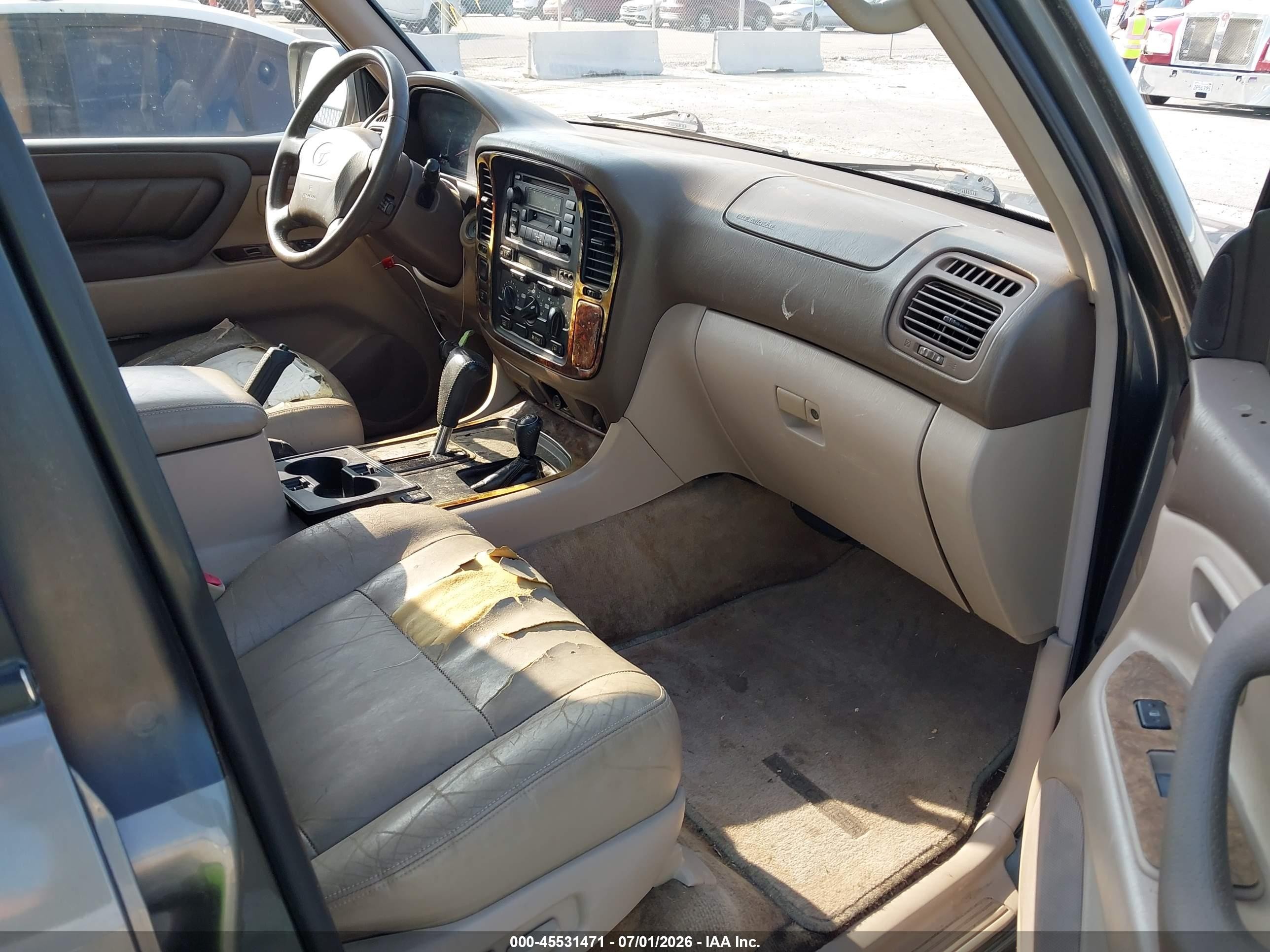 1999 Toyota Land Cruiser   Brown vin: JT3HT05J0X0055574
