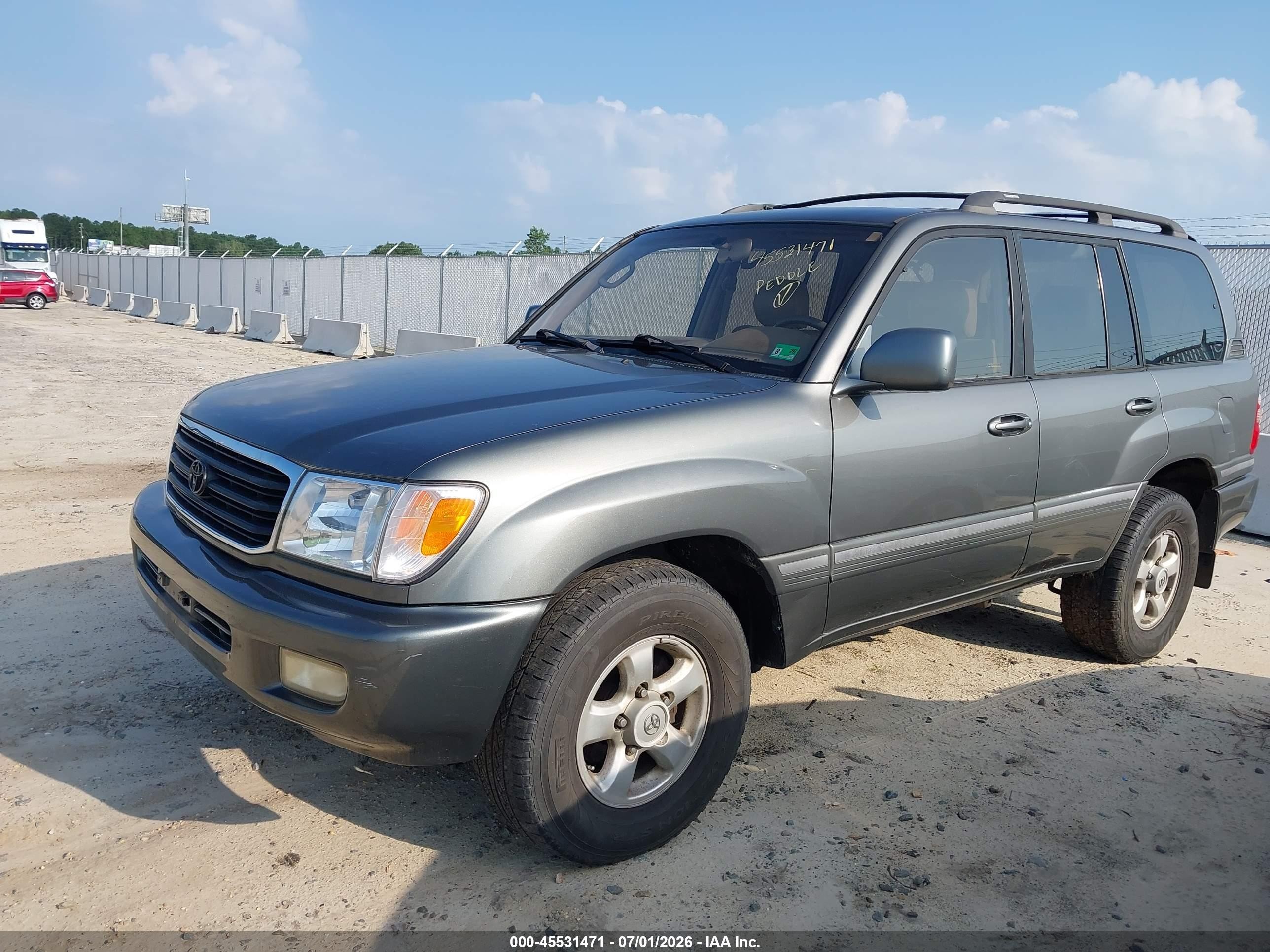 1999 Toyota Land Cruiser   Brown vin: JT3HT05J0X0055574
