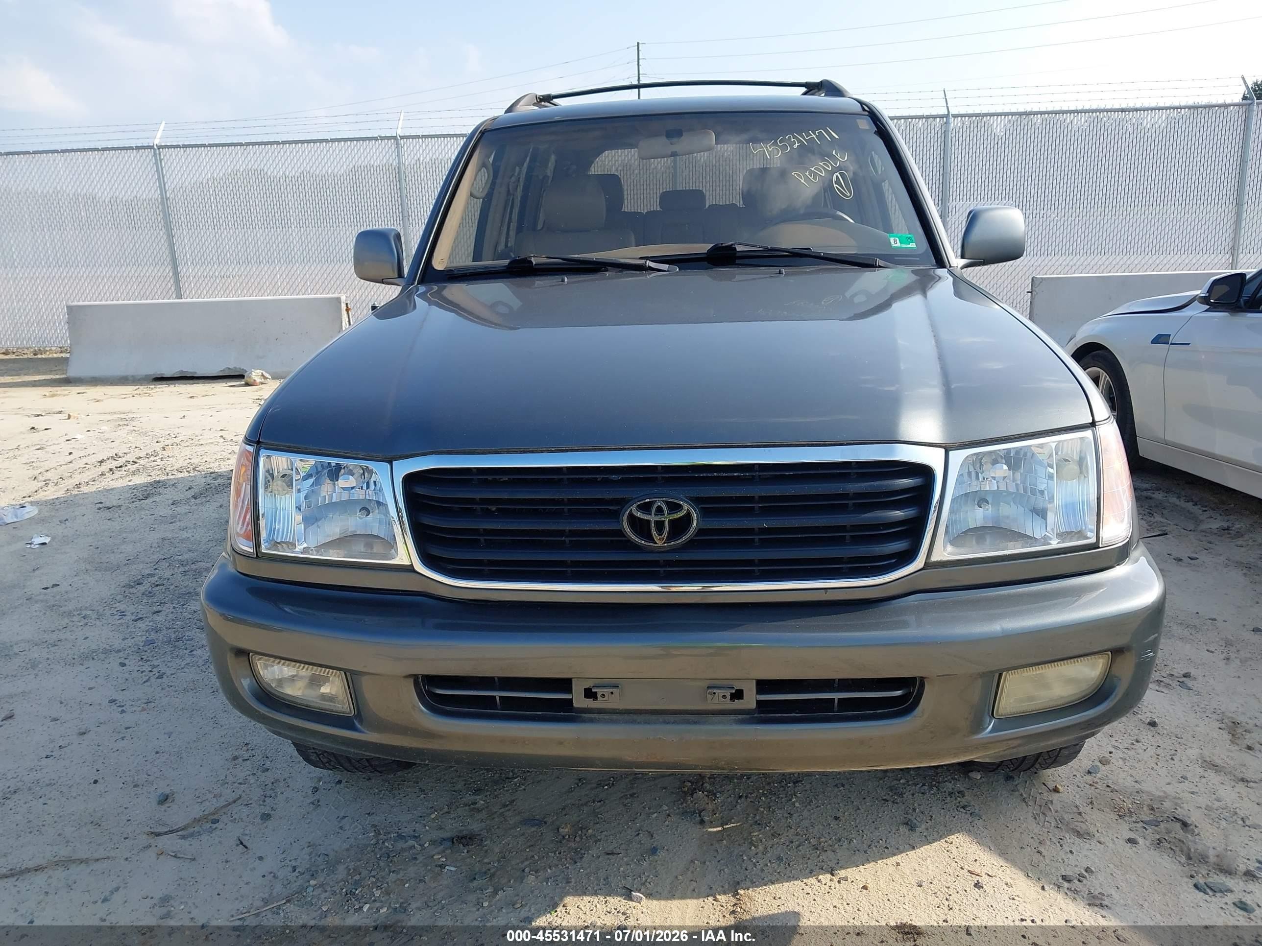 1999 Toyota Land Cruiser   Brown vin: JT3HT05J0X0055574