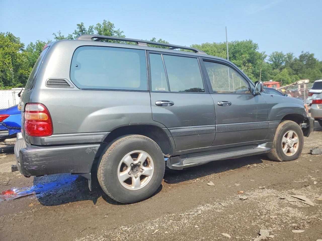 2000 Toyota Land Cruiser Base Brown vin: JT3HT05J0Y0095087