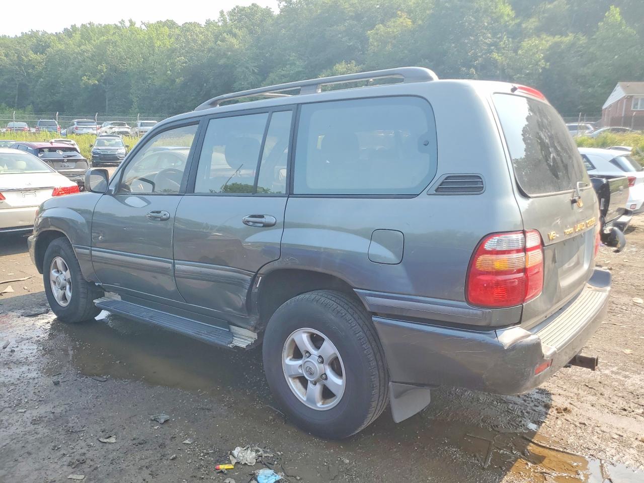 2000 Toyota Land Cruiser Base Brown vin: JT3HT05J0Y0095087