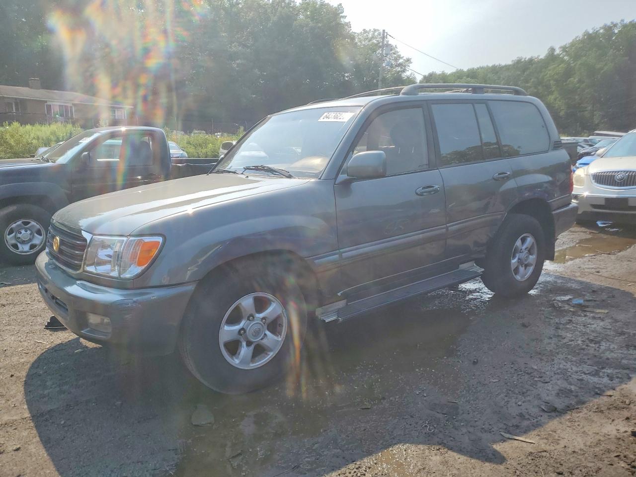 2000 Toyota Land Cruiser Base Brown vin: JT3HT05J0Y0095087