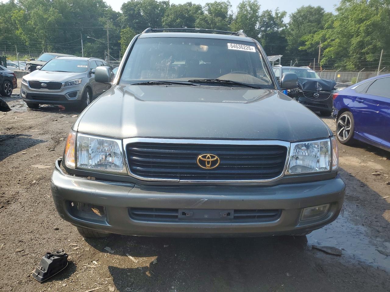 2000 Toyota Land Cruiser Base Brown vin: JT3HT05J0Y0095087