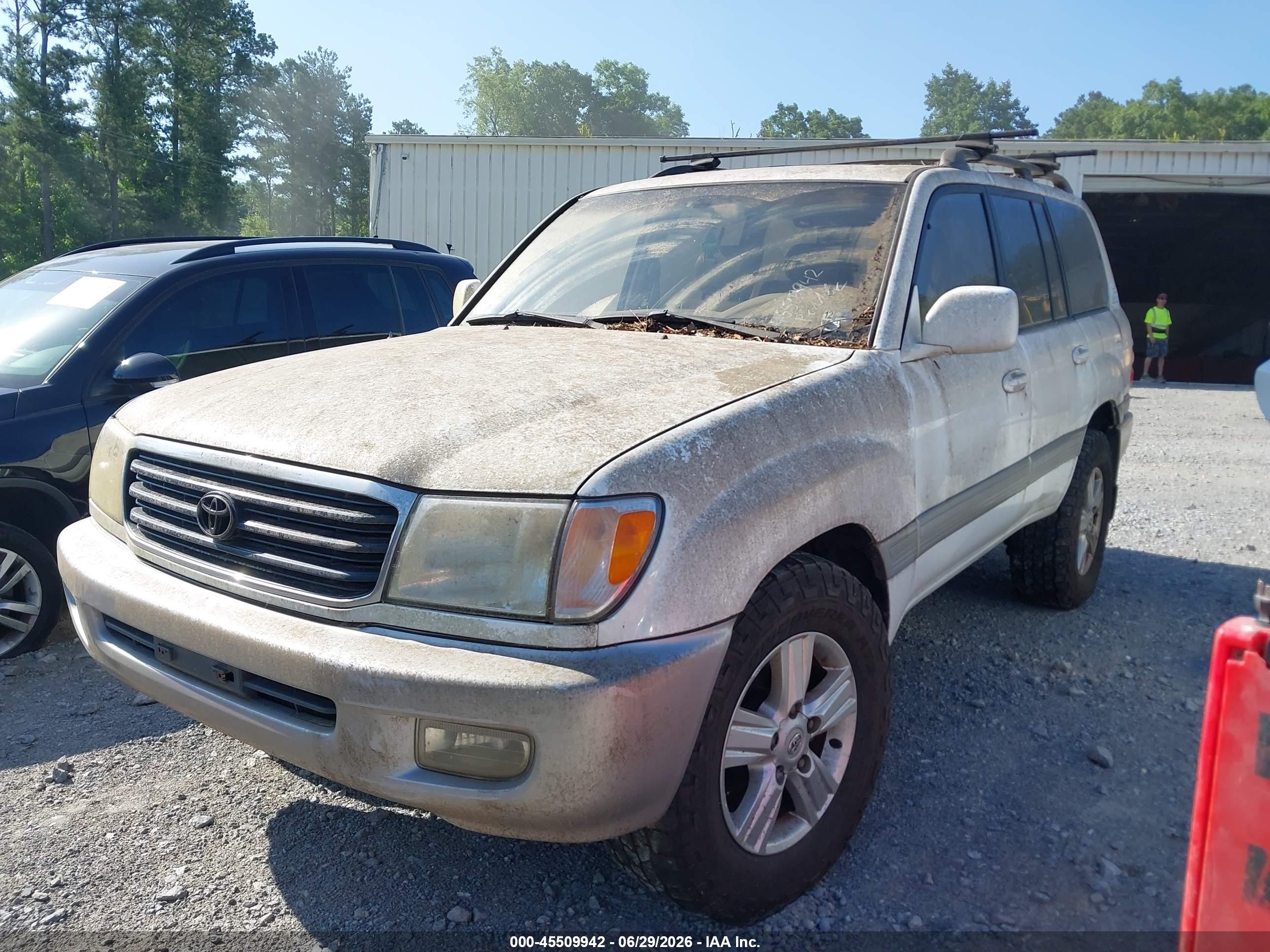 1999 Toyota Land Cruiser   White vin: JT3HT05J1X0066955