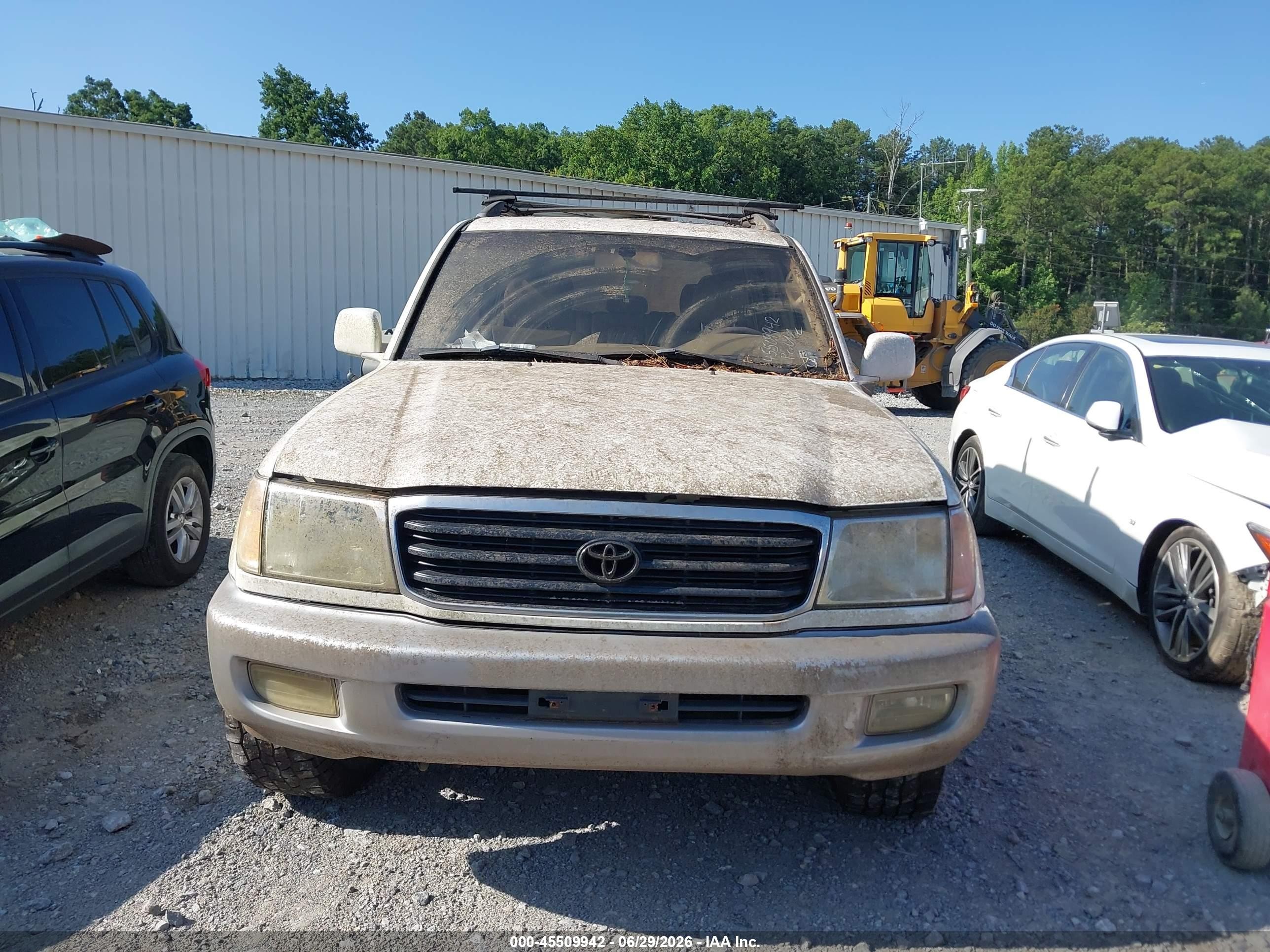 1999 Toyota Land Cruiser   White vin: JT3HT05J1X0066955