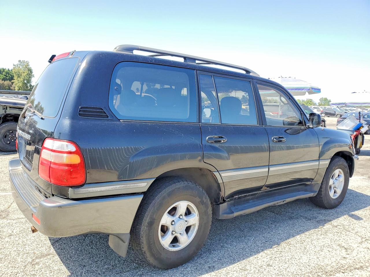 1999 Toyota Land Cruiser Base Black vin: JT3HT05J2X0069086
