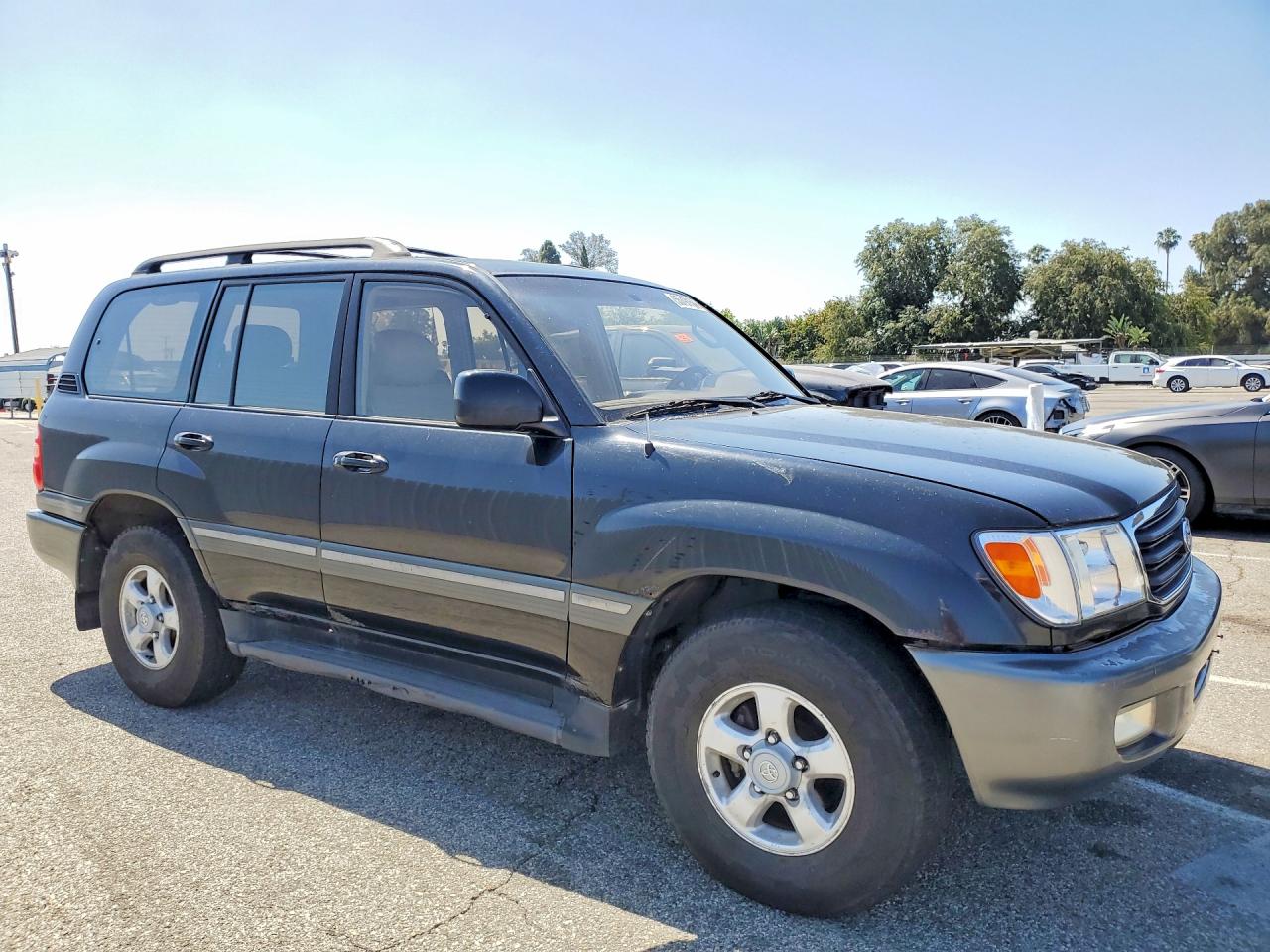 1999 Toyota Land Cruiser Base Black vin: JT3HT05J2X0069086