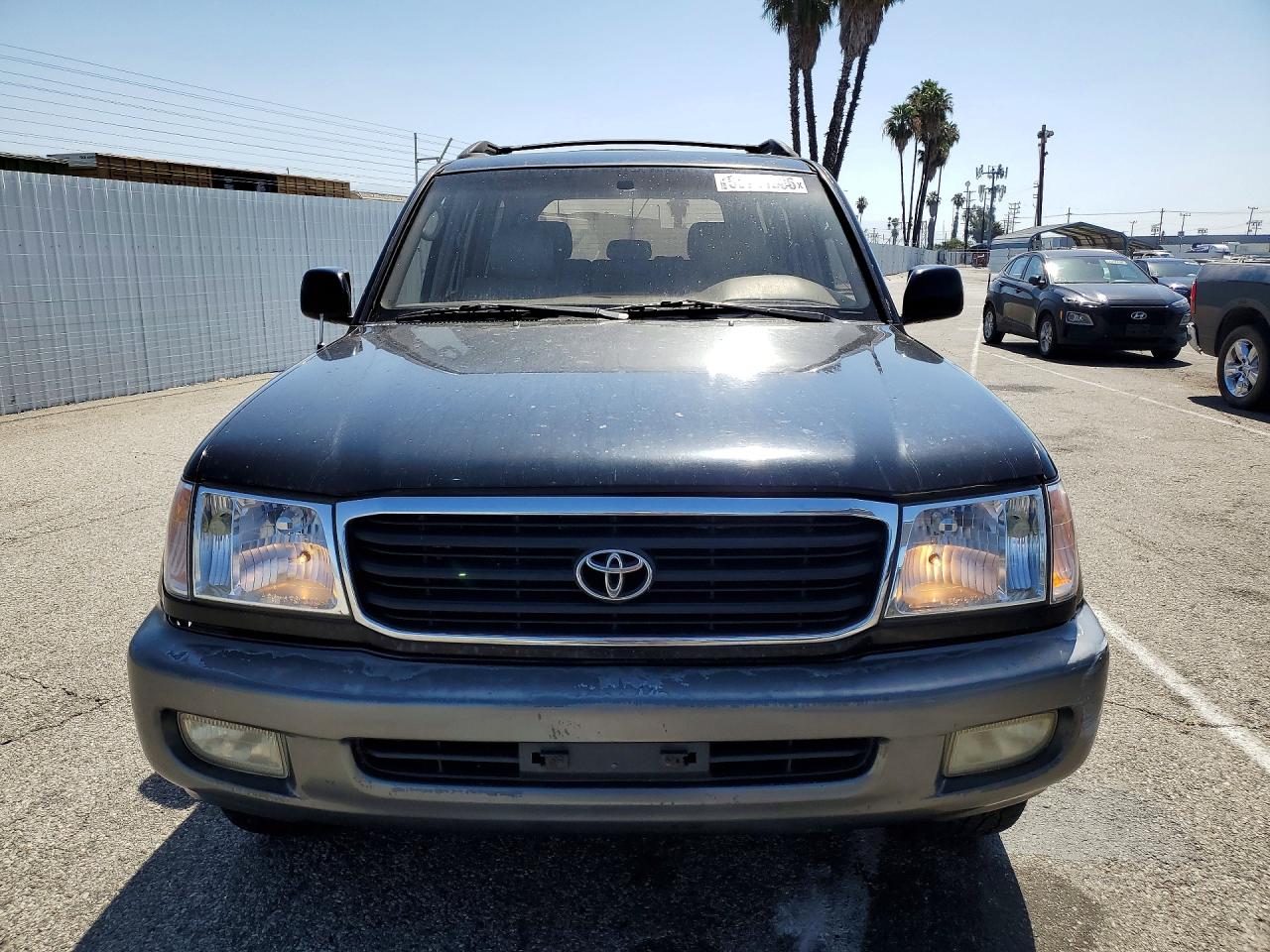 1999 Toyota Land Cruiser Base Black vin: JT3HT05J2X0069086