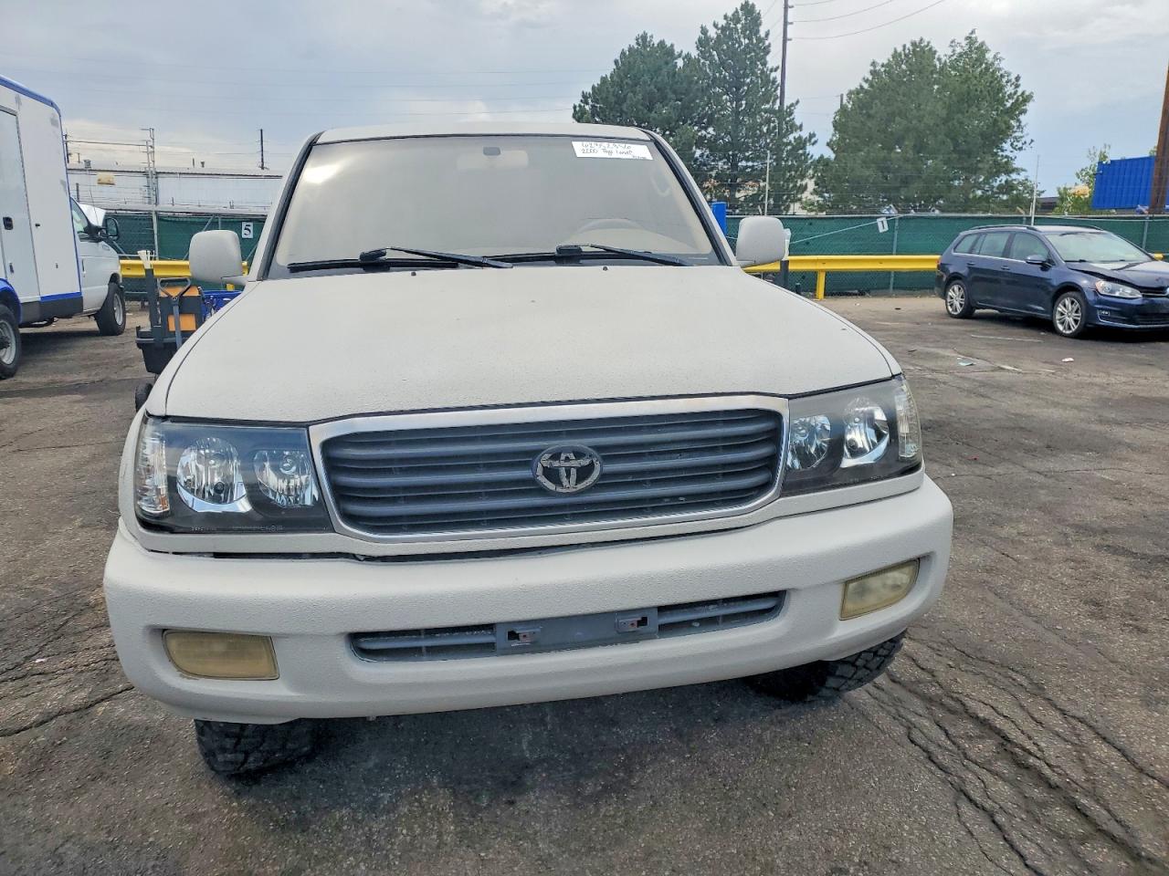 2000 Toyota Land Cruiser Base Beige vin: JT3HT05J2Y0096774