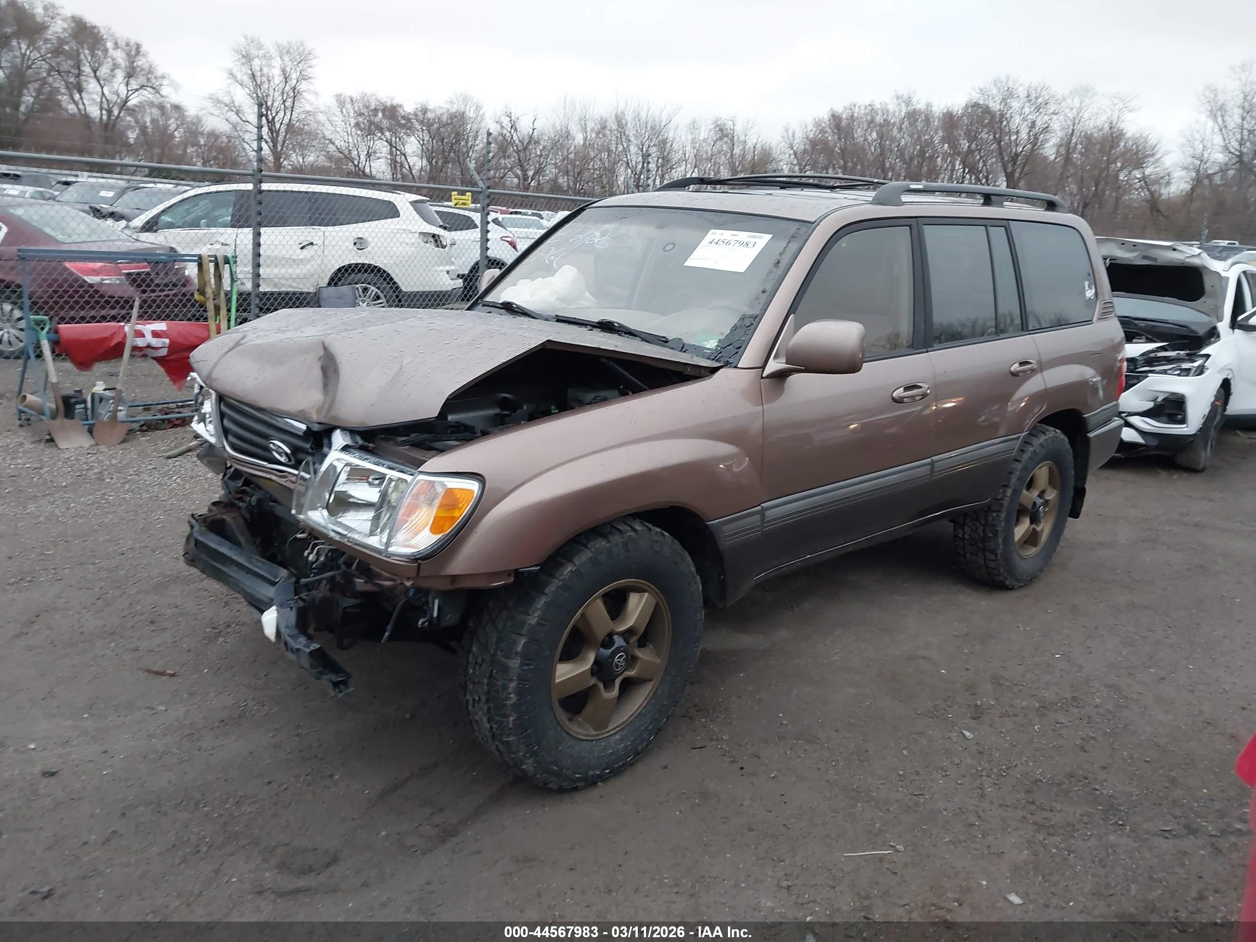 2000 Toyota Land Cruiser   Tan vin: JT3HT05J3Y0102811