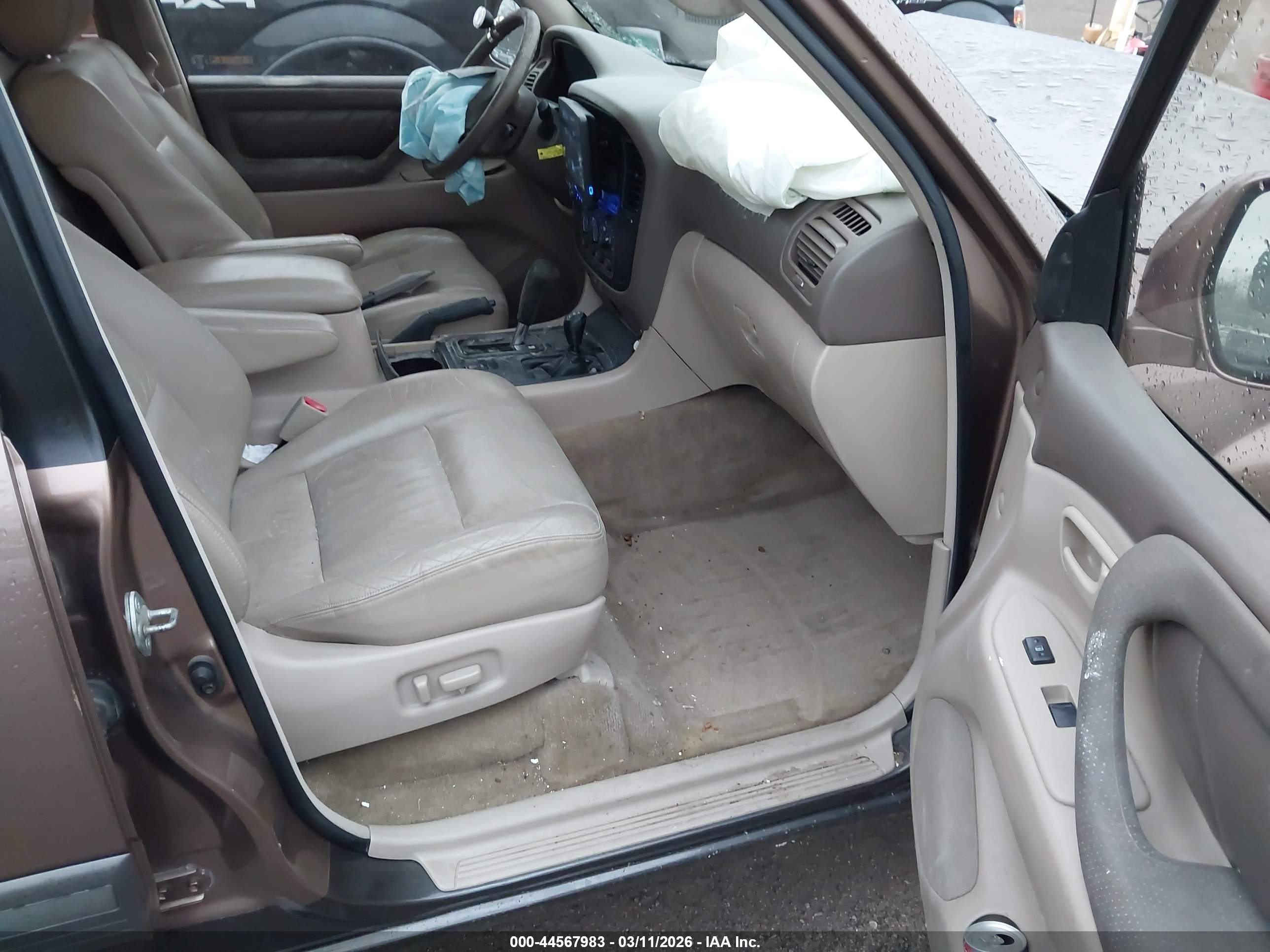 2000 Toyota Land Cruiser   Tan vin: JT3HT05J3Y0102811