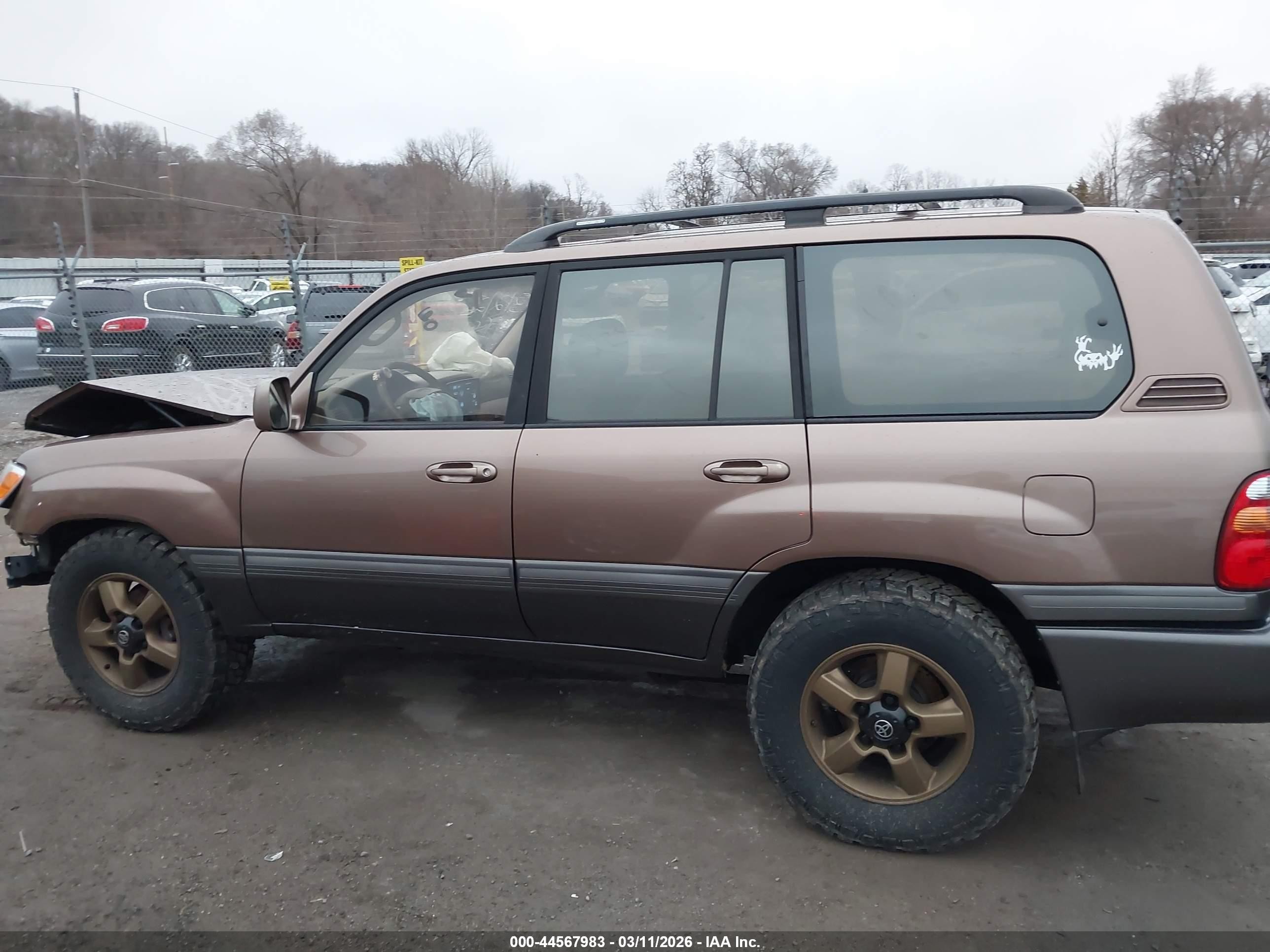 2000 Toyota Land Cruiser   Tan vin: JT3HT05J3Y0102811