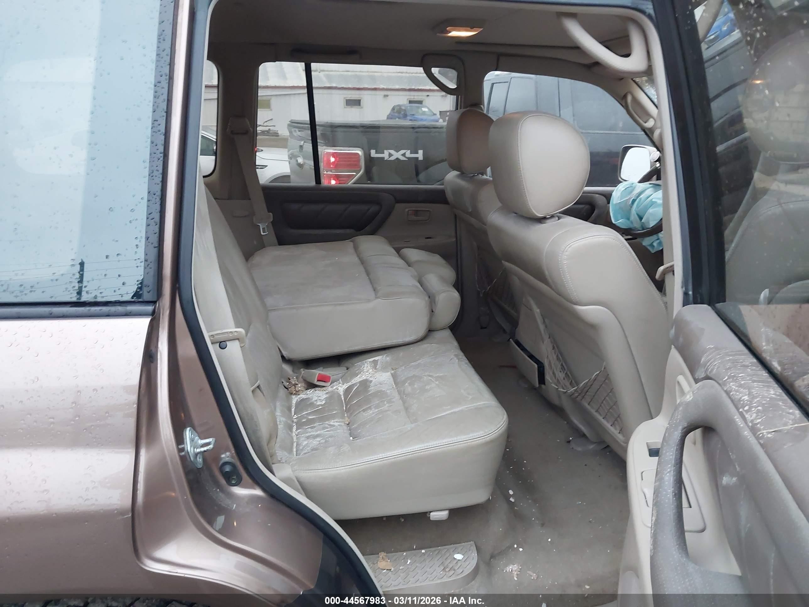 2000 Toyota Land Cruiser   Tan vin: JT3HT05J3Y0102811