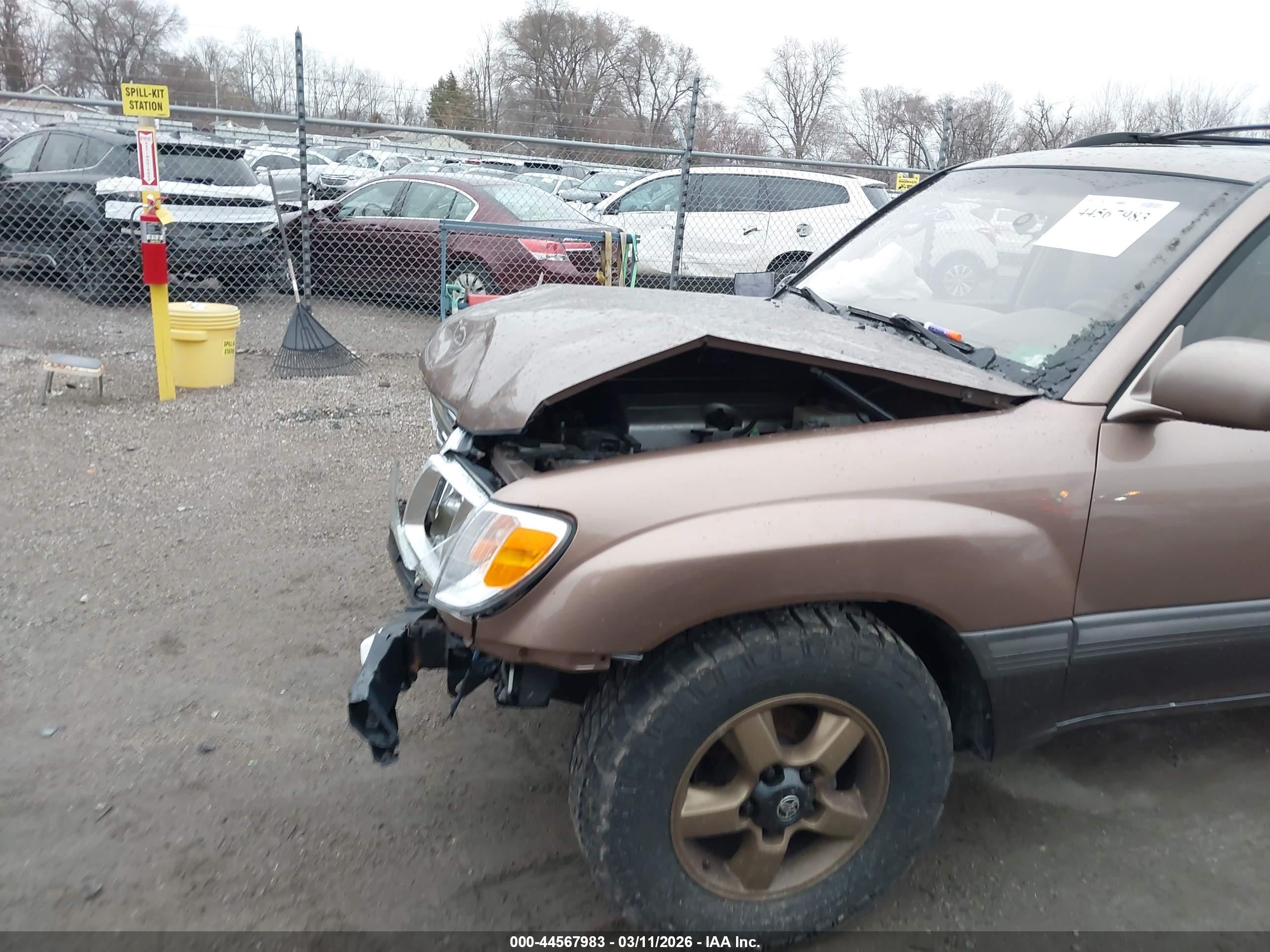2000 Toyota Land Cruiser   Tan vin: JT3HT05J3Y0102811
