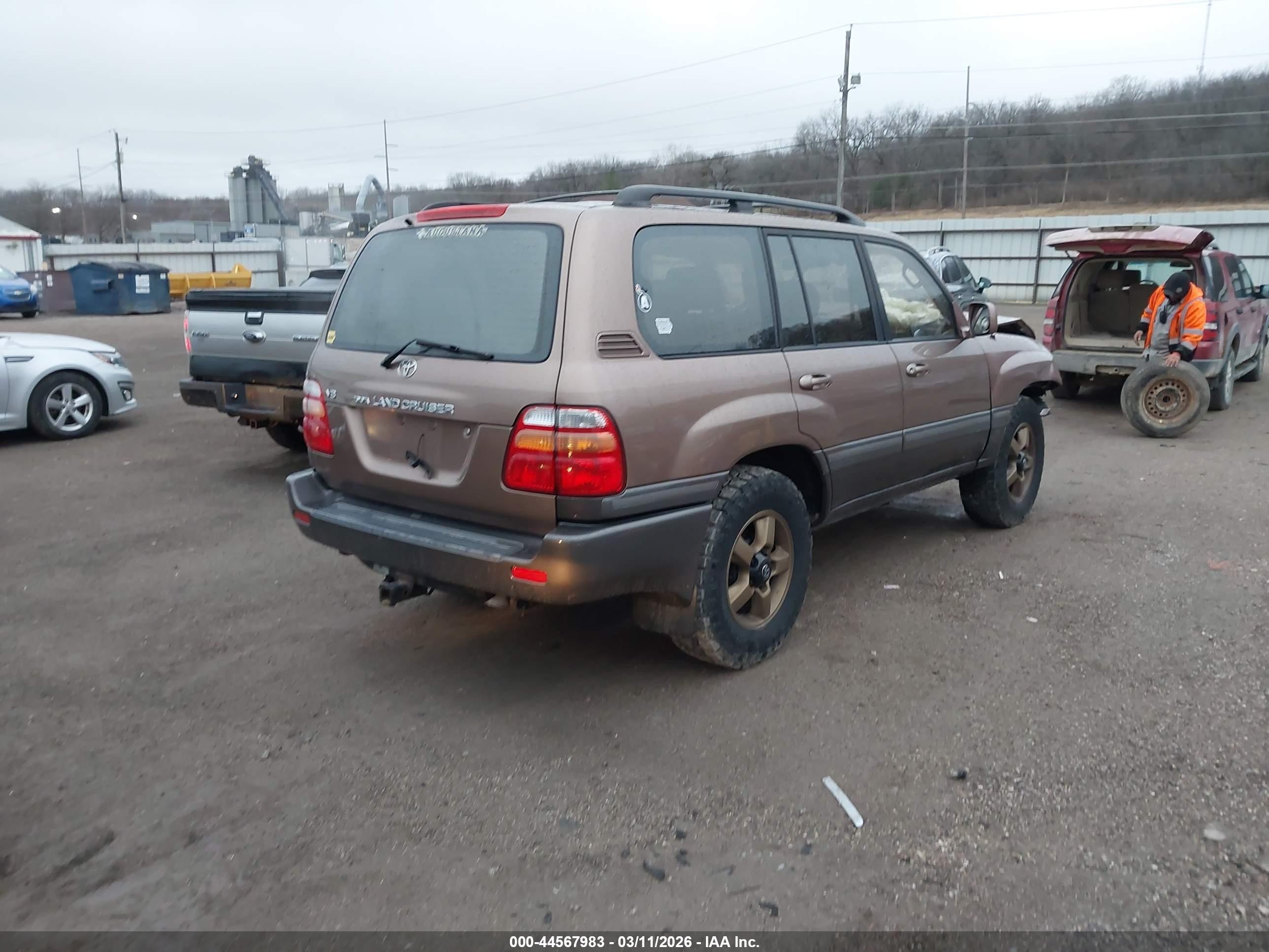 2000 Toyota Land Cruiser   Tan vin: JT3HT05J3Y0102811