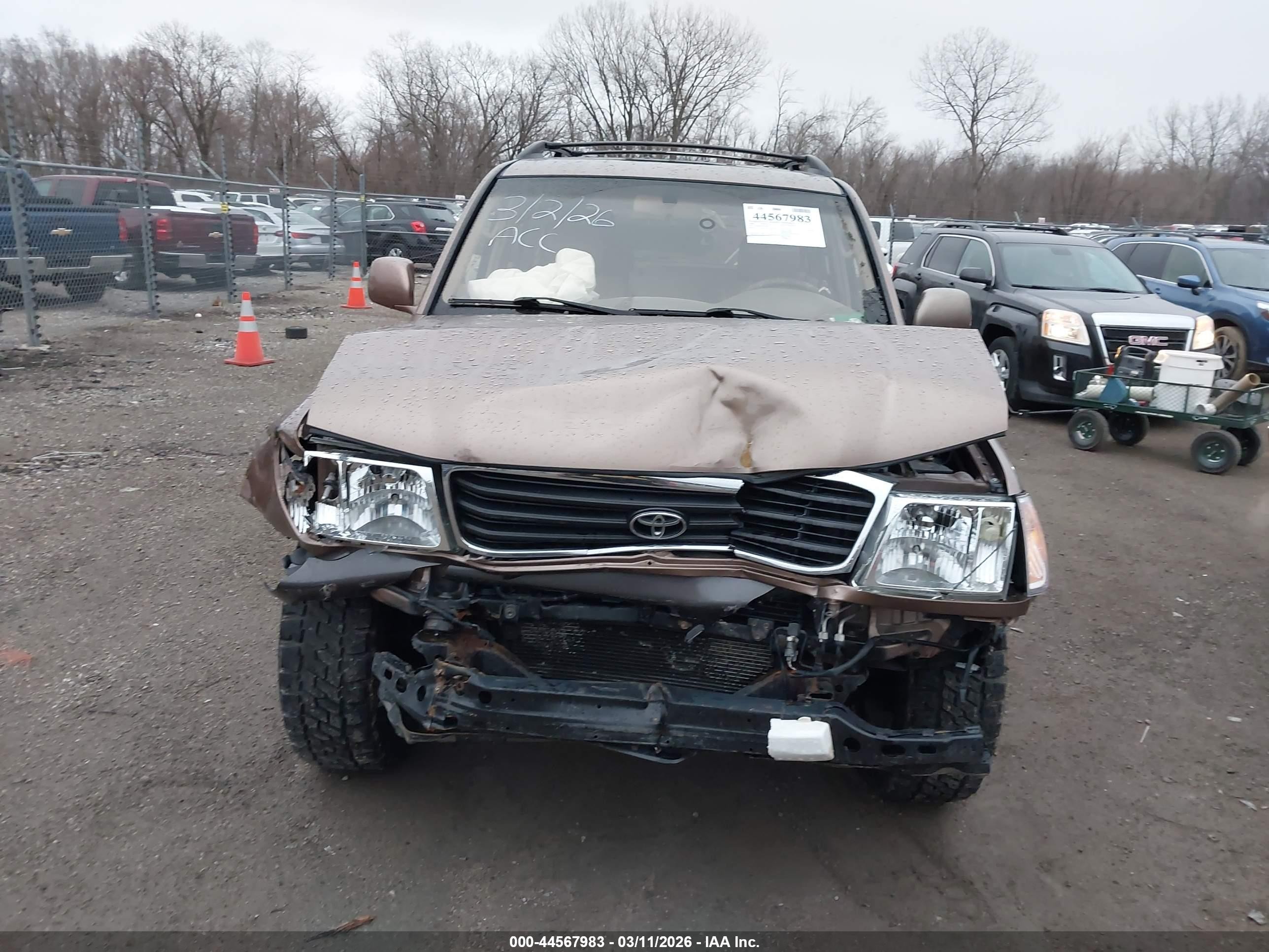 2000 Toyota Land Cruiser   Tan vin: JT3HT05J3Y0102811