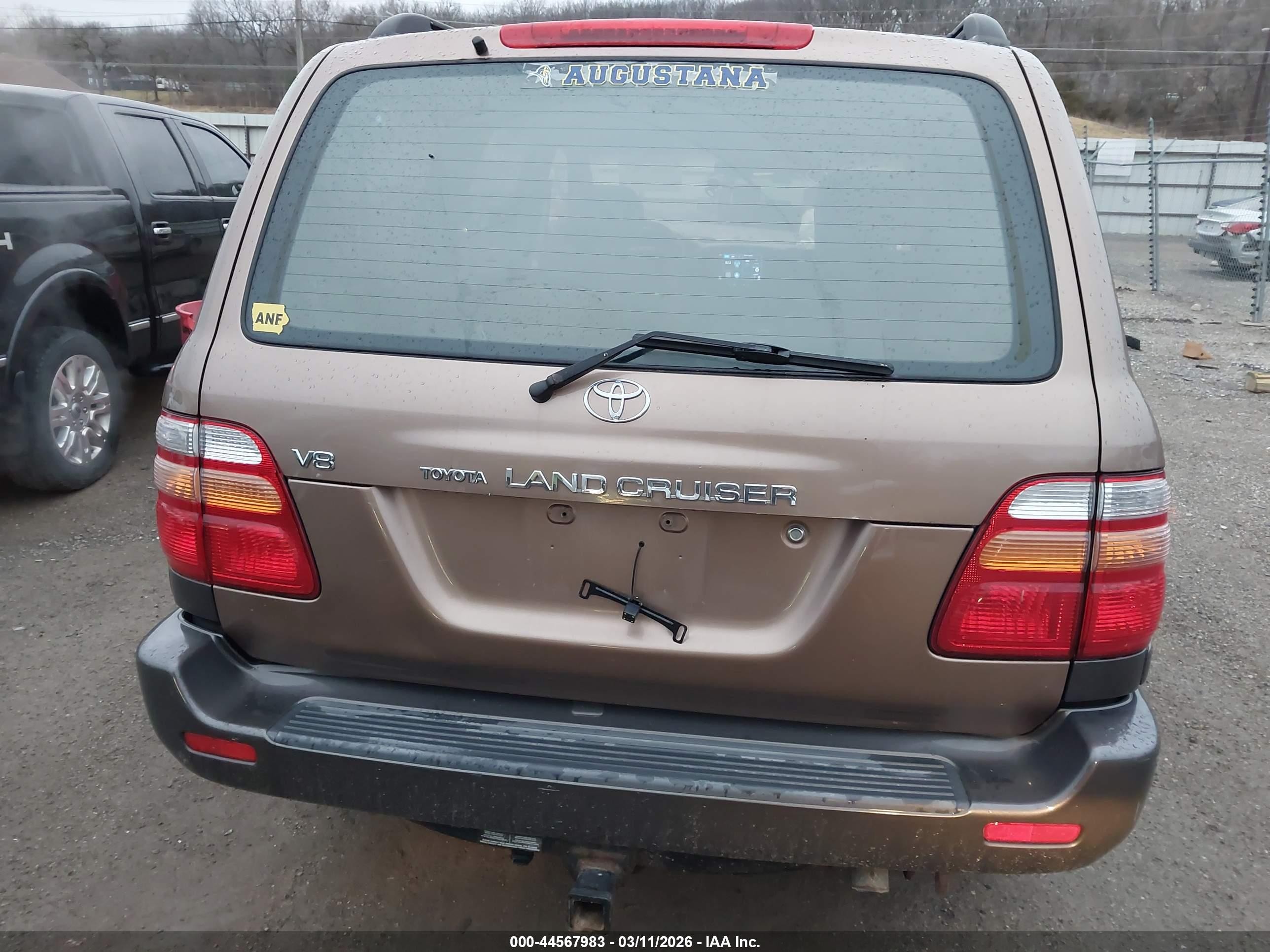 2000 Toyota Land Cruiser   Tan vin: JT3HT05J3Y0102811