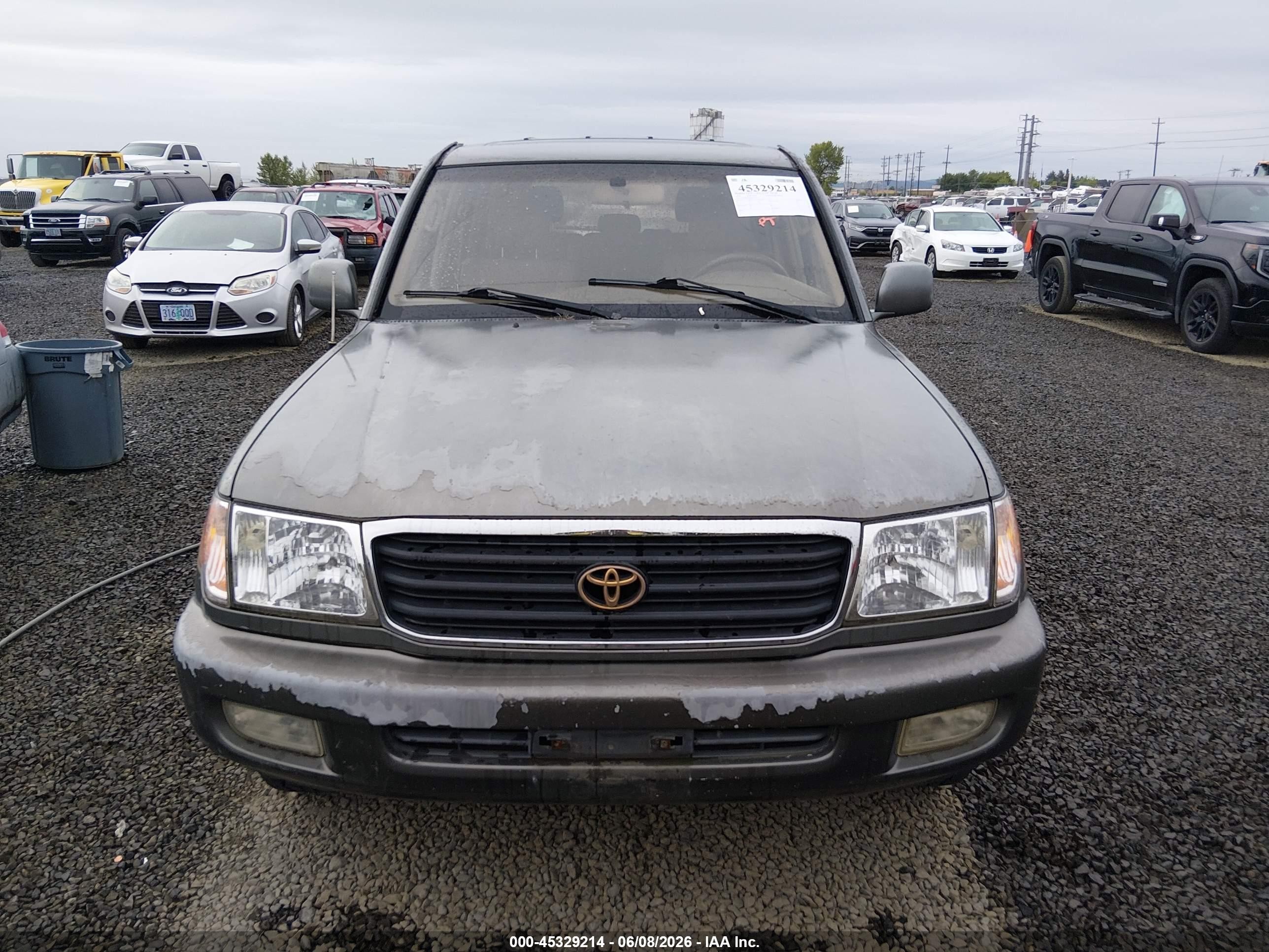 1999 Toyota Land Cruiser   Brown vin: JT3HT05J4X0041418