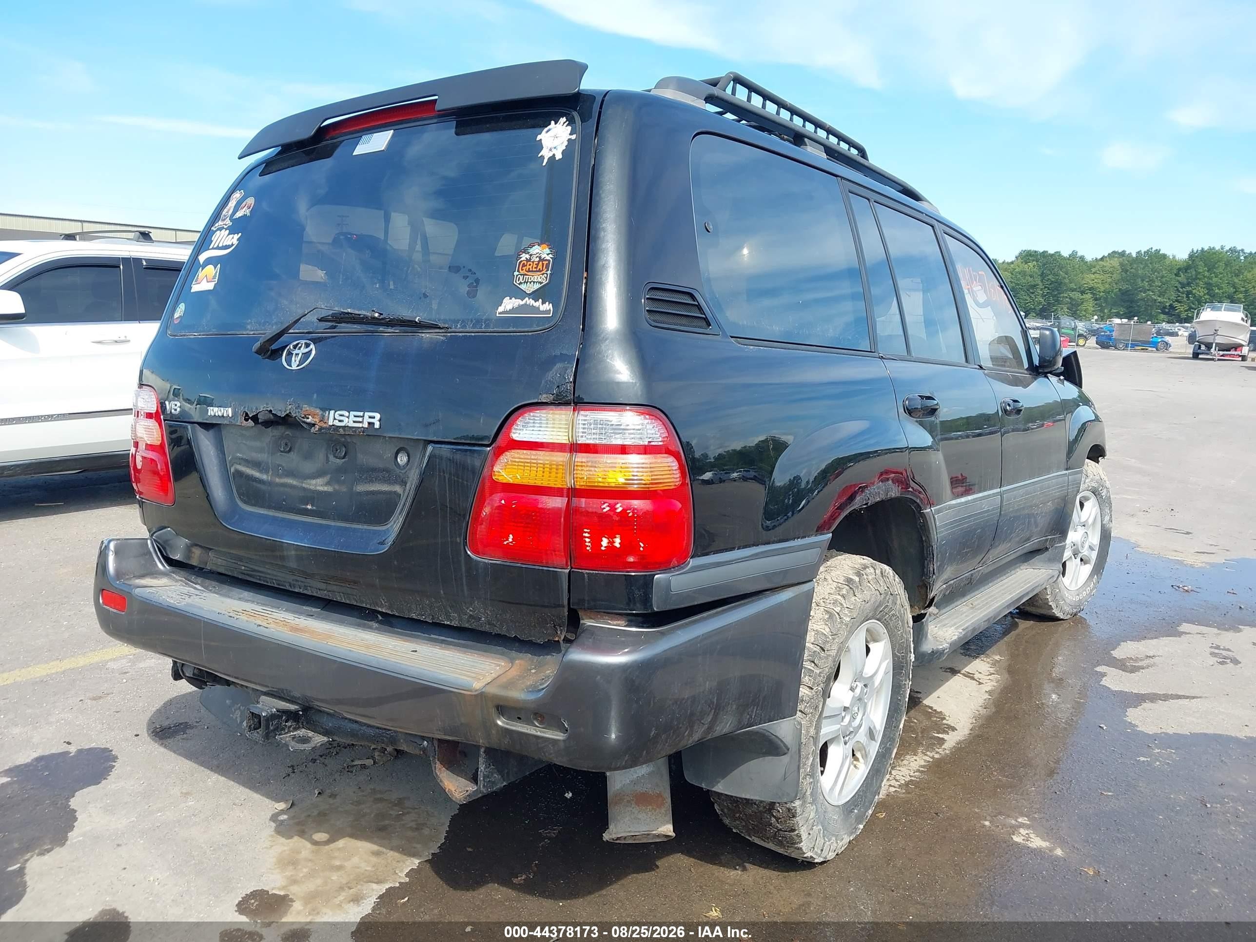 1999 Toyota Land Cruiser Черный vin: JT3HT05J4X0057506
